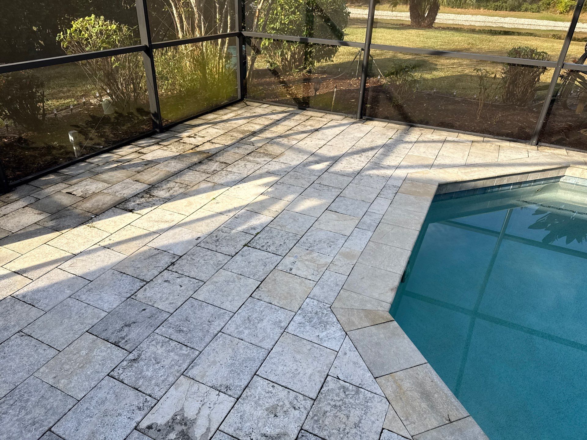 Paver Pool Deck & Screen Enclosure Cleaning | River Wilderness, Parrish FL by Sunshine AquaWash