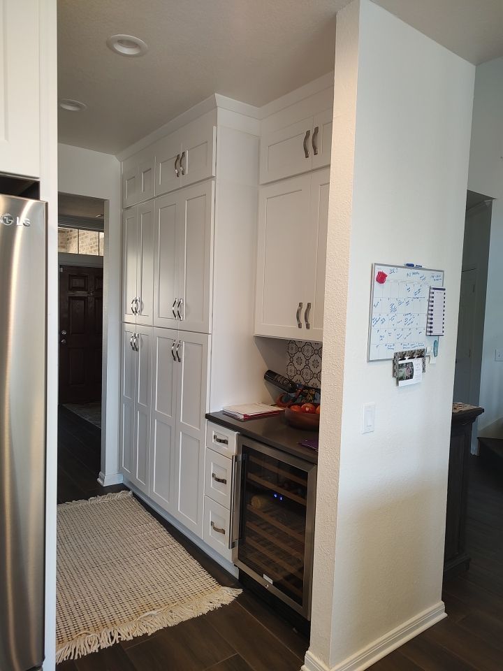 Stone Oak San Antonio Kitchen Remodel Featuring Custom White Cabinetry & Expanded Island by Legacy Bath and Kitchen 