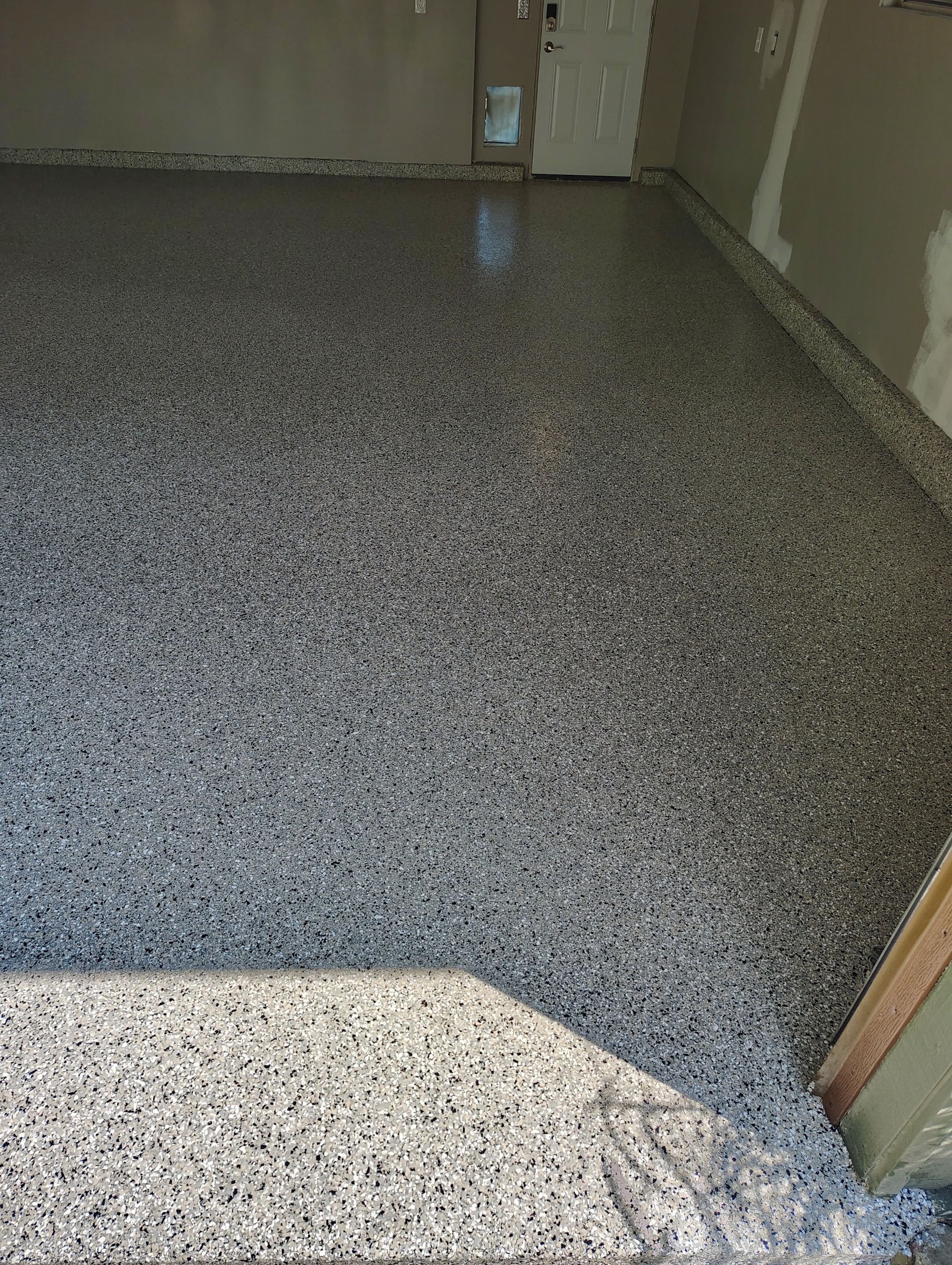 Garage Floor Coating with Decorative Flakes in Tea by Select Painting, Coatings & Garage Cabinets