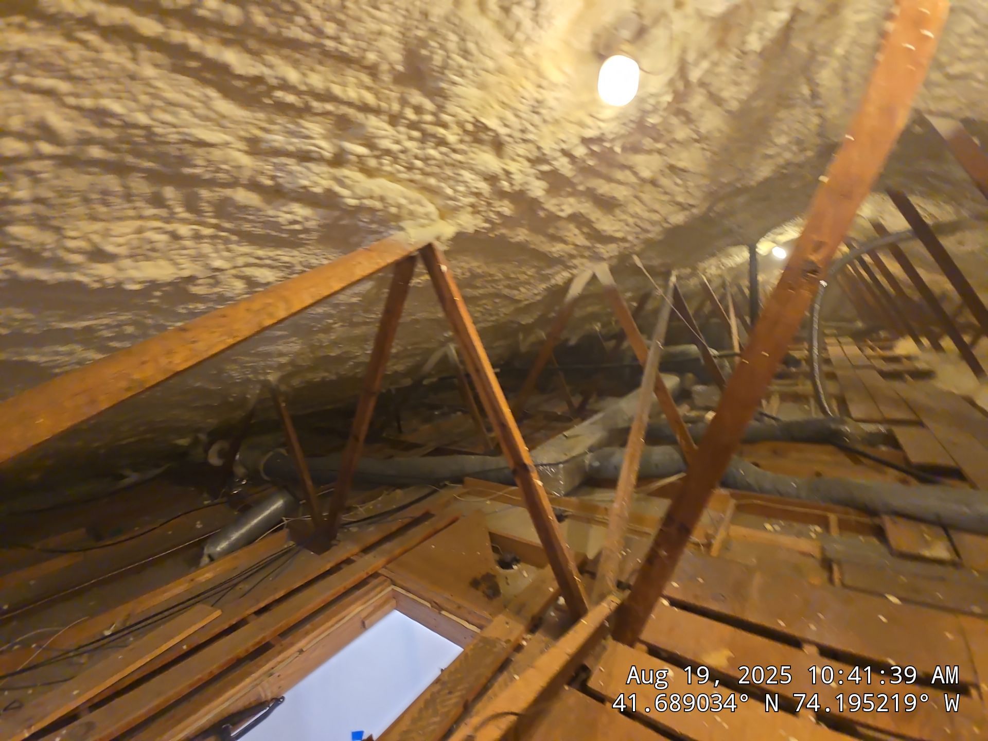 Attic Insulation using open cell spray foam by NYS Foam & Energy