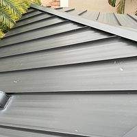 24ga 1.5" Mechanical Seam Matte Black by Total Roofing System The Metal Roof Experts