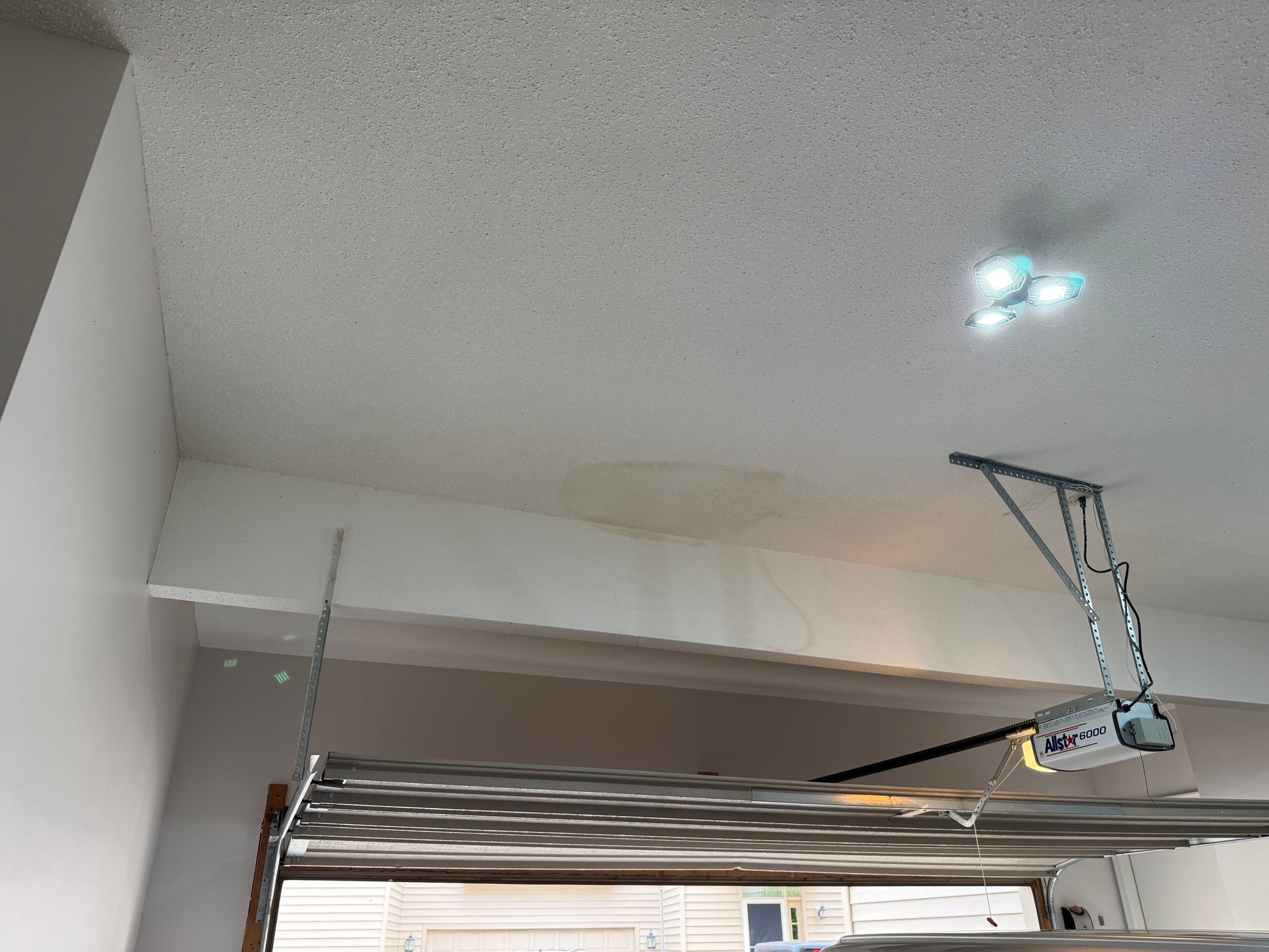 Custom Epoxy Flake Floor Coating and Ceiling Repair in Muskegon by Gordon Painting