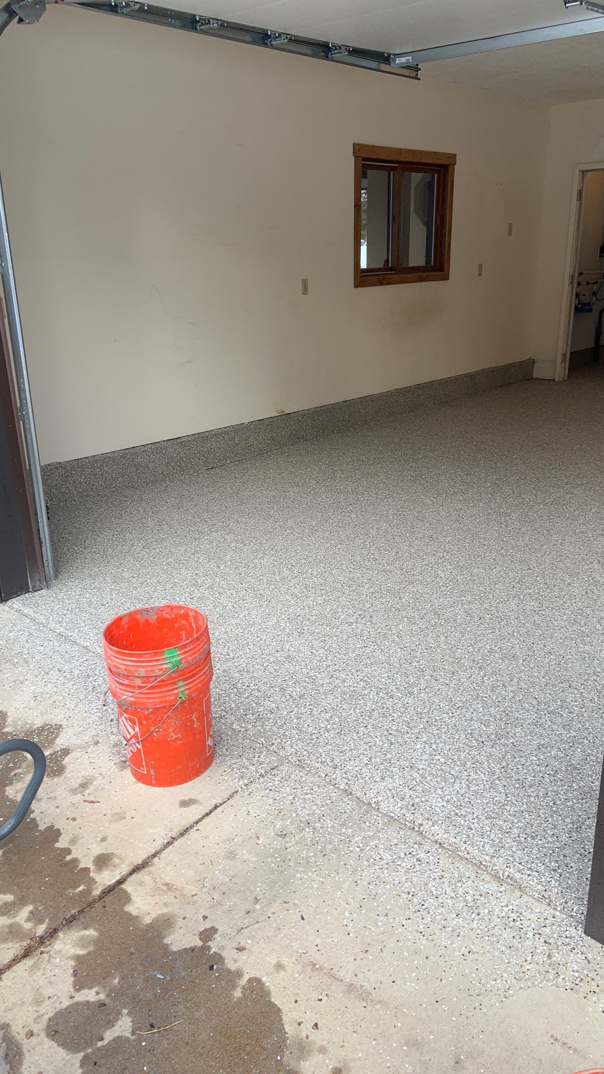 Garage Transformation using Pebble Beach by Croc Coatings, LLC