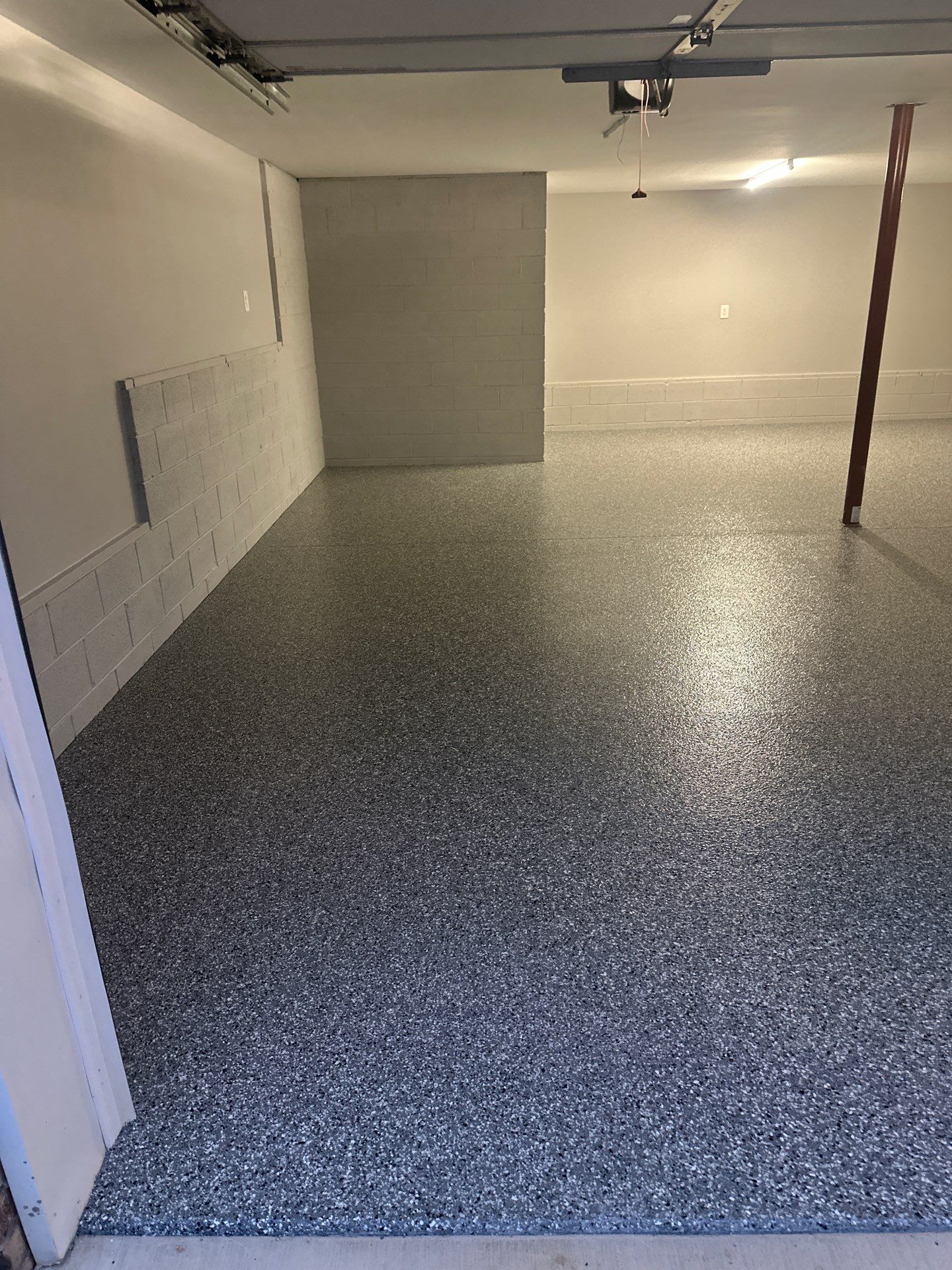 Garage Floor Coating using Wombat by My Garage Floor Guys