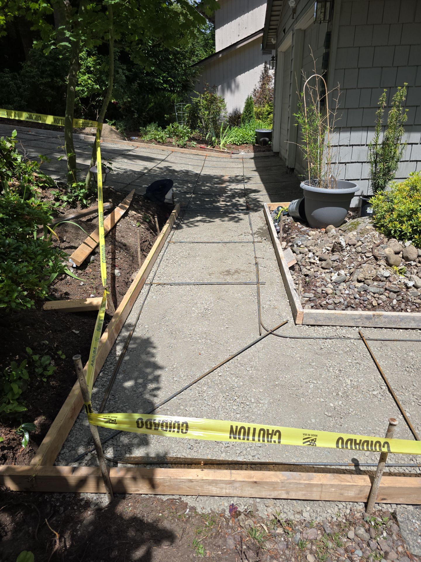 Kate | Concrete Driveway & Walkway by Jireh Asphalt & Concrete Inc 