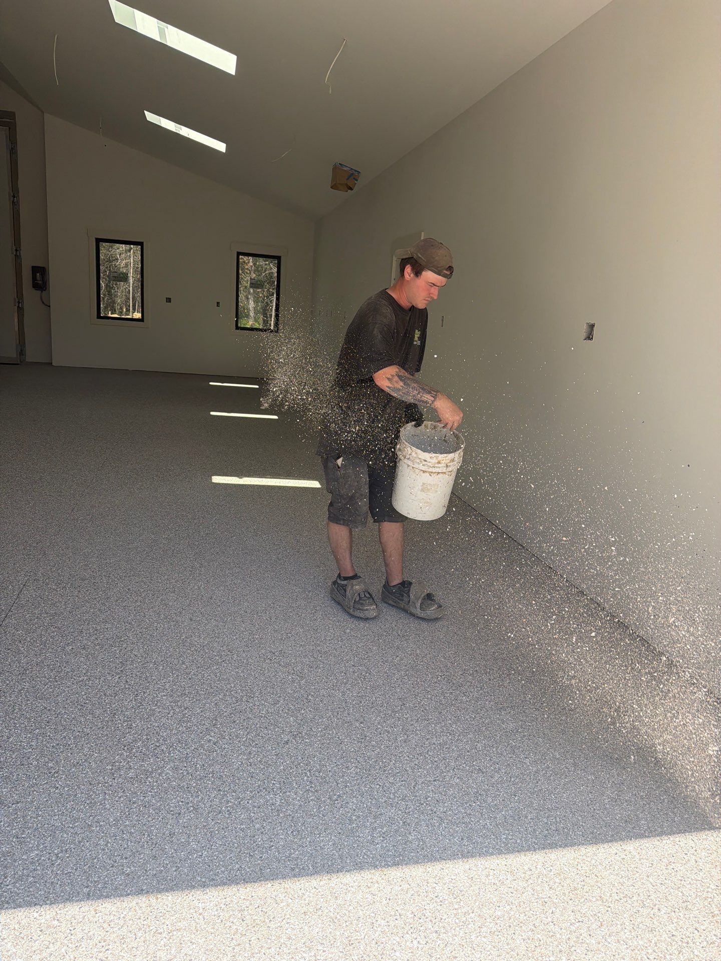 Claystone Hybrid Concrete Floor Coating for Newport Shop Transformation by Croc Coatings, LLC