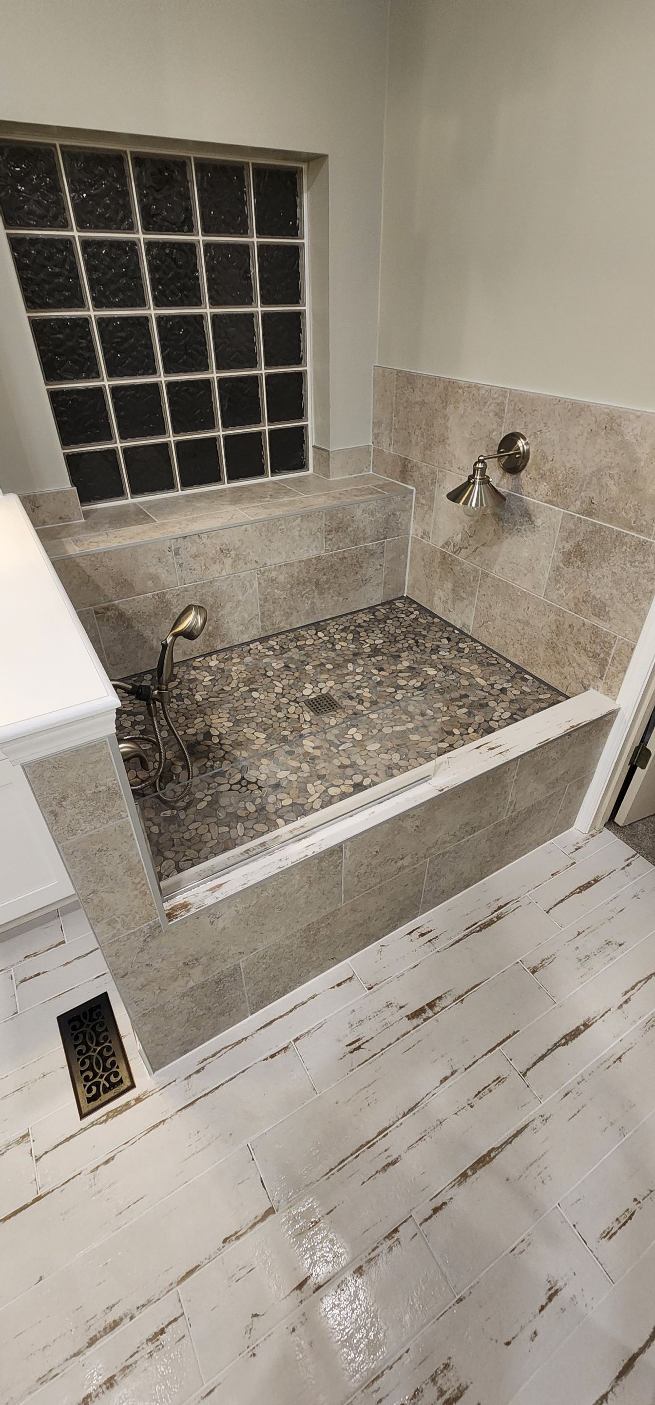 Full bathroom with giant shower AND doggy shower by The Shower Company