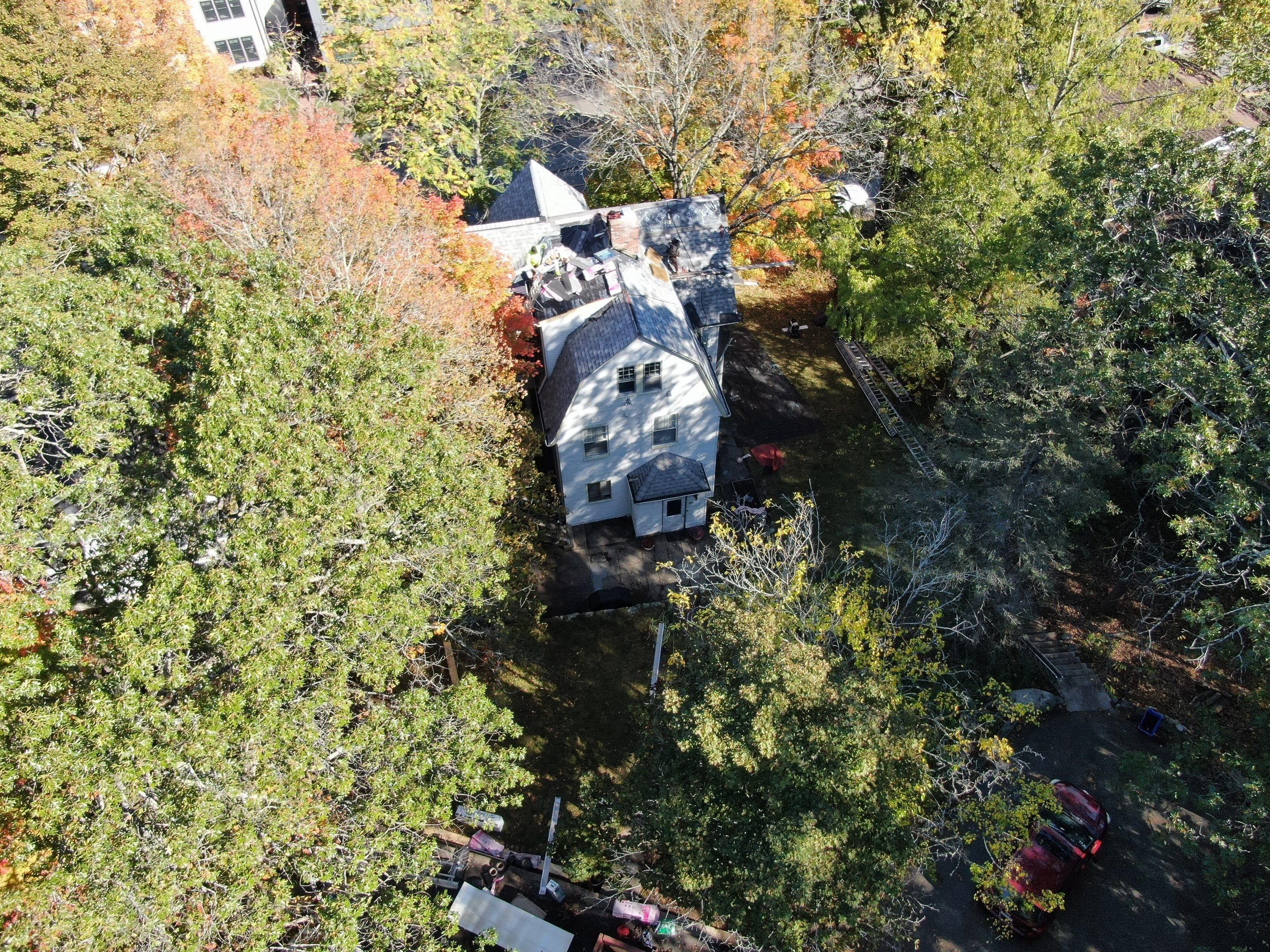 Full Roof & Porch EPDM Replacement with Skylight and Chimney Repairs by Mighty Dog Roofing of Greater Middlesex County