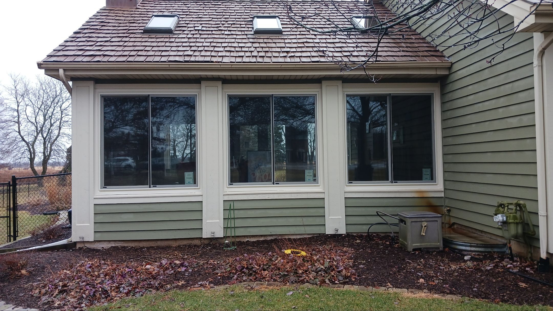 New Windows and Door For 4 Seasons Room by NextWave Exteriors