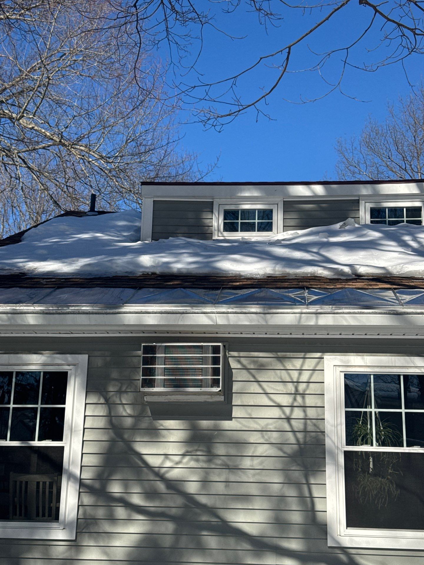 Snow/Ice Belt & Ice Dam Removal Project in Woburn by Mighty Dog Roofing of Greater Middlesex County