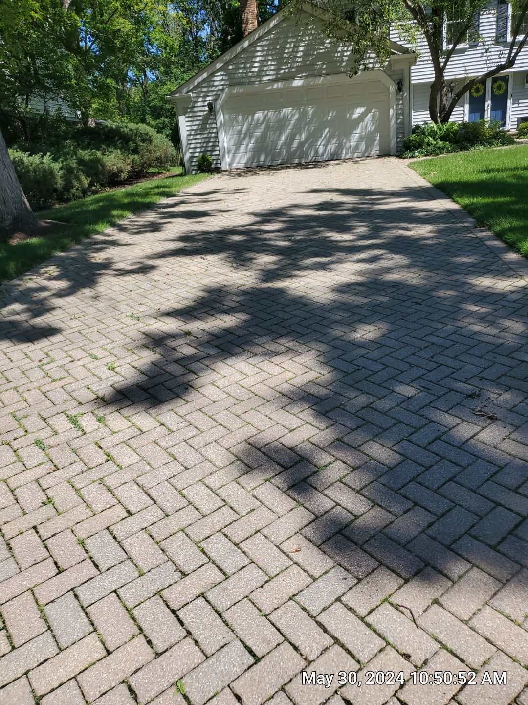 Brick paver clean, sand and seal.  using Polysweep polymeric sand by Northern Power Washing LLC.