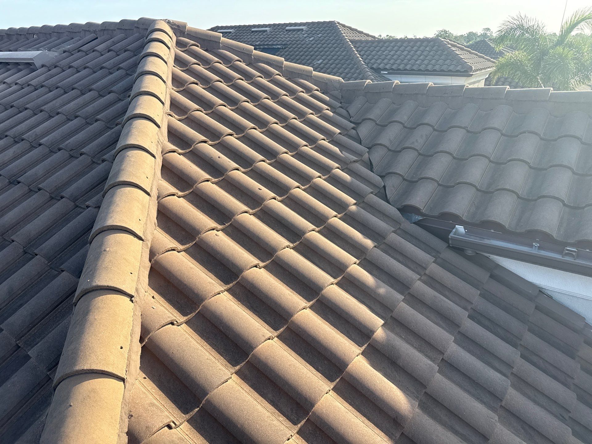Soft Wash Roof Cleaning – Concrete Tile Roof | Artisan Lakes Esplanade, Palmetto, FL by Sunshine AquaWash