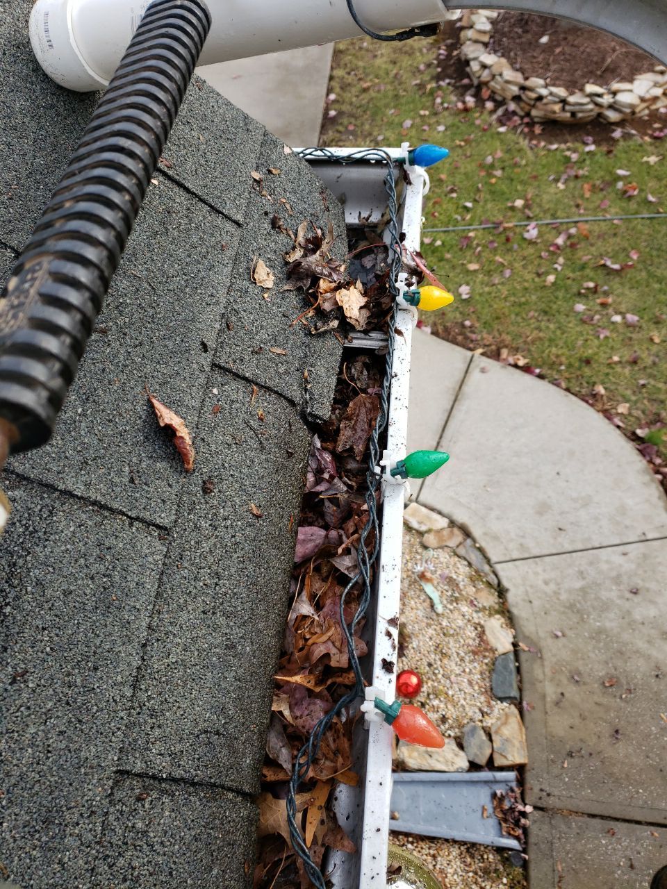 gutters and Driveway by Power Wash Masters LLC