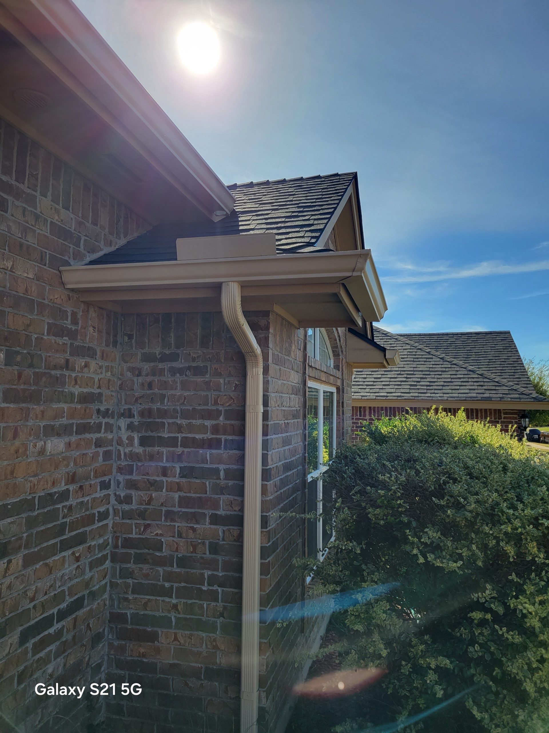 roof replacement & gutter installation in Edmond by McCann's Roofing and Construction