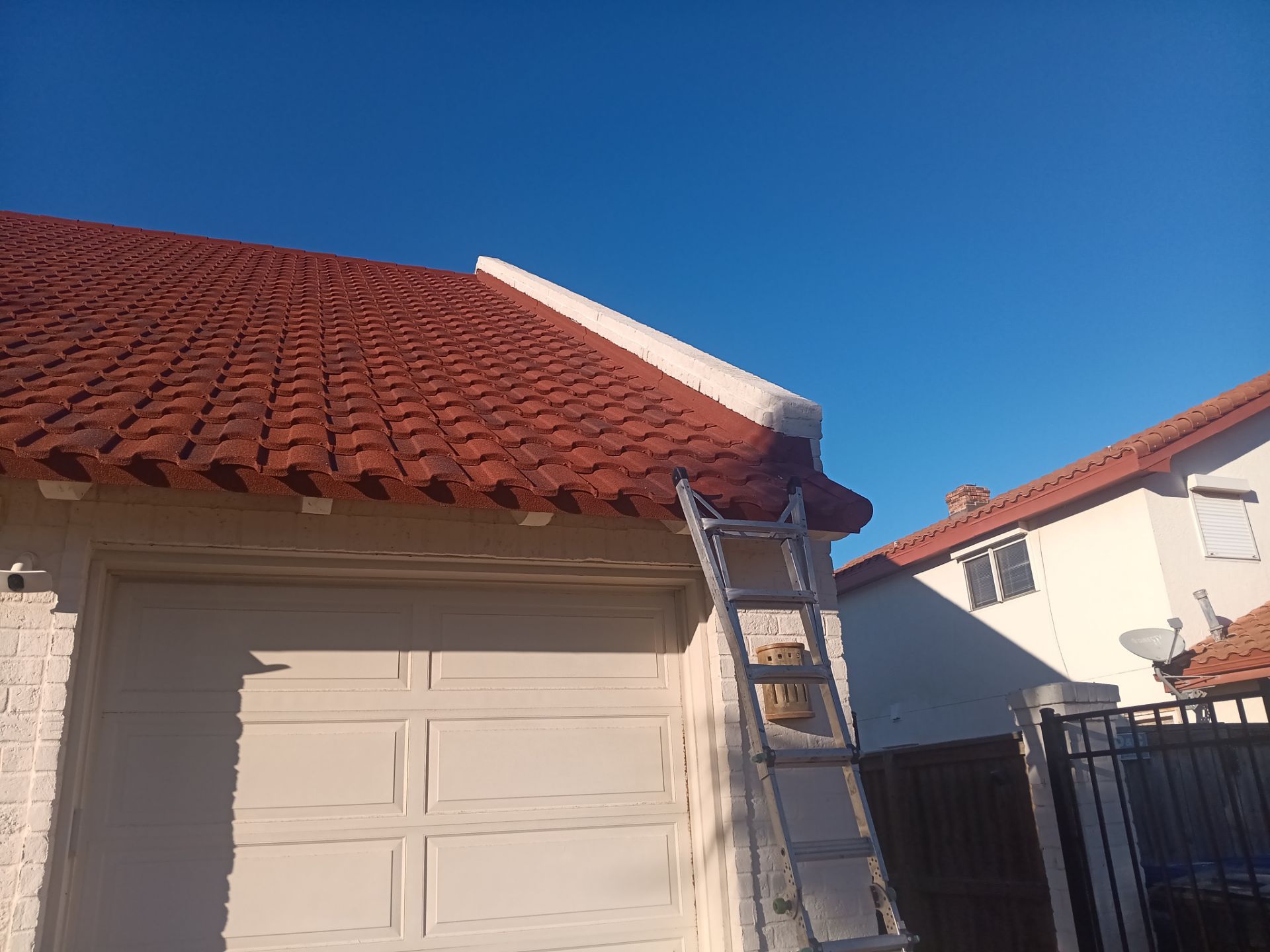 Off with the Tile and on with the TILCOR stone coated metal.  by Bayfront Roofing and Construction