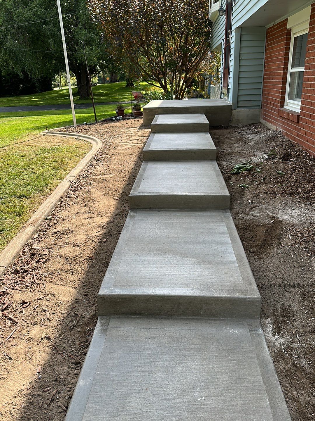 Steps with Broom Finish  by NG Masonry & Construction LLC