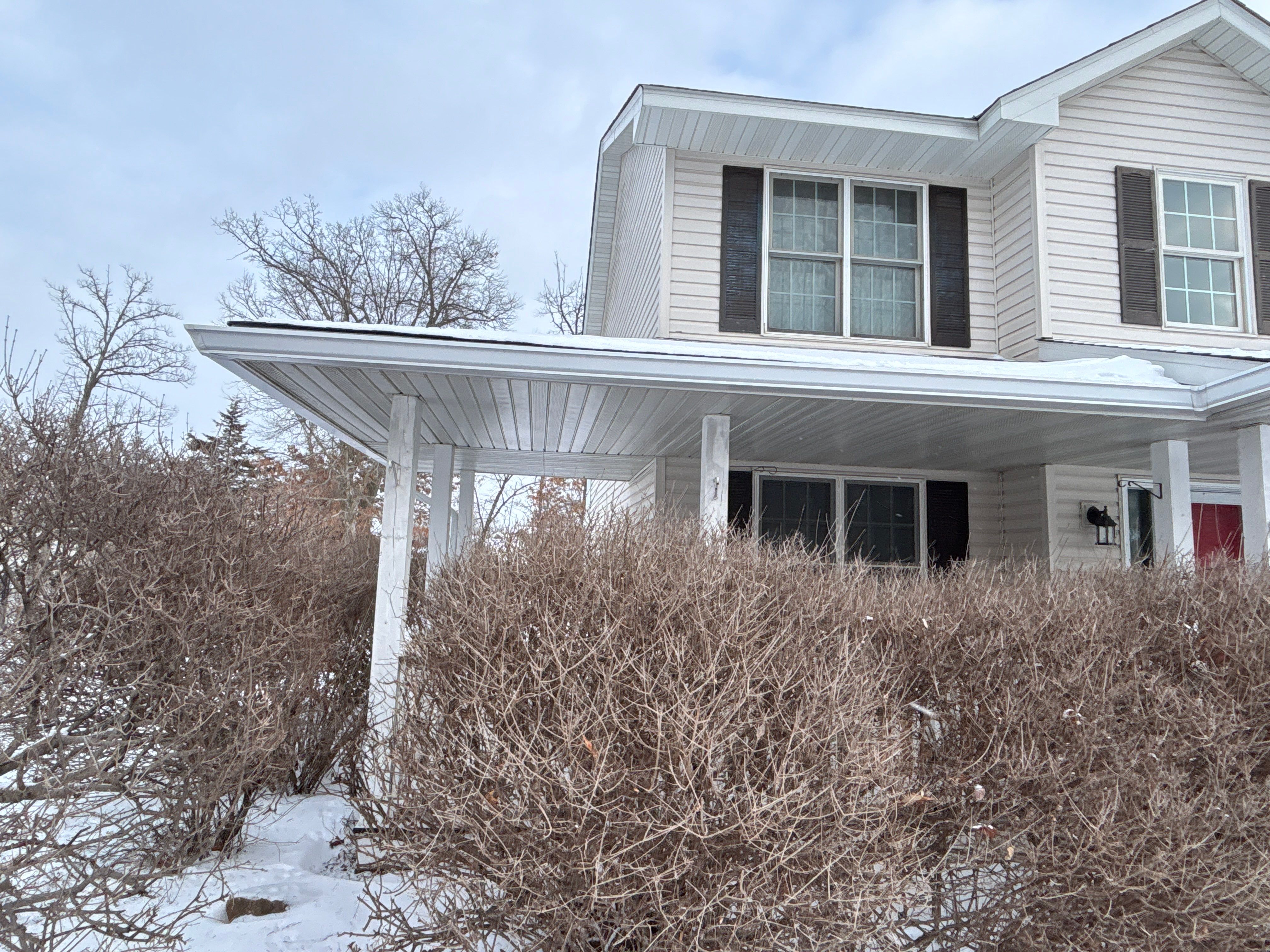 White Seamless Gutter and Downspout Installation in Big Lake by Next Level Seamless Gutters / Exteriors Inc.