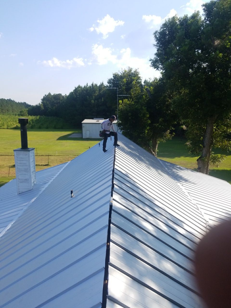 Residential Roofing Installation using Metal roofing by American Roofing & Construction LLC