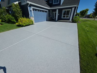 Battleship Hybrid Concrete Coating for Post Falls Patio and Driveway