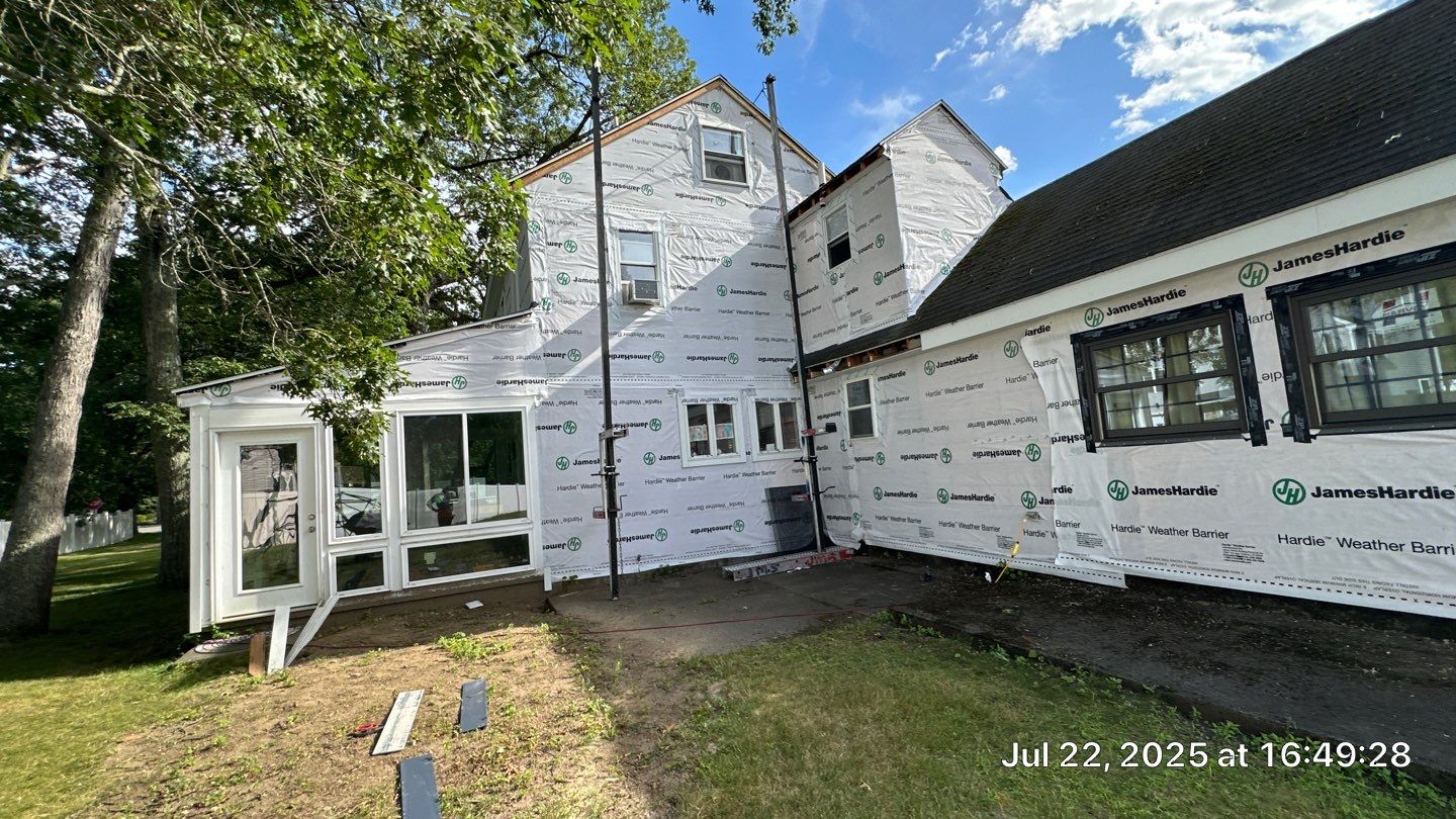 James Hardie Lap Siding Installation in Chelmsford, MA by Mighty Dog Roofing of Greater Middlesex County