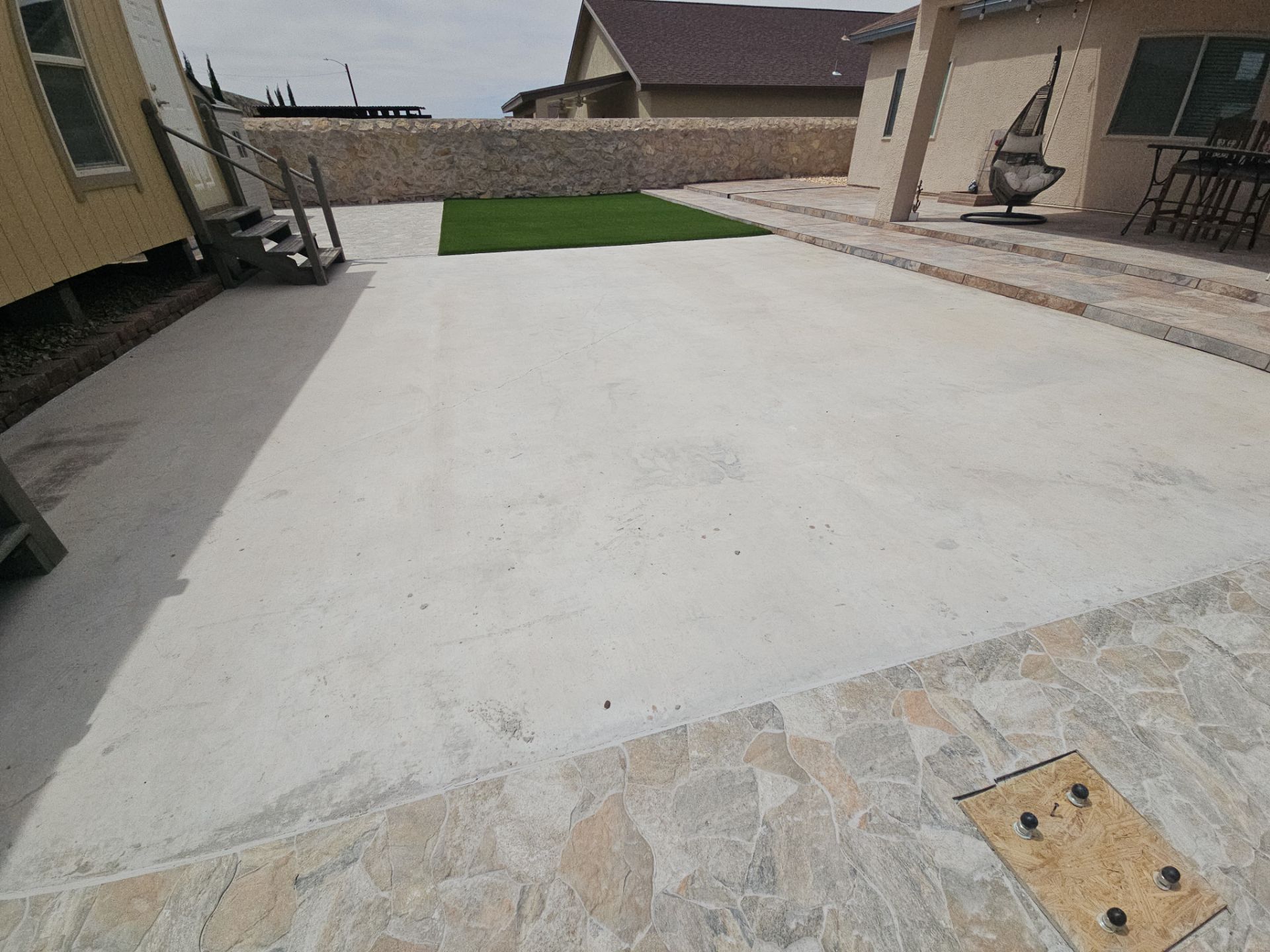 Exterior Building Painting and Repairs with Basketball Court and Playground by Regal Renovate