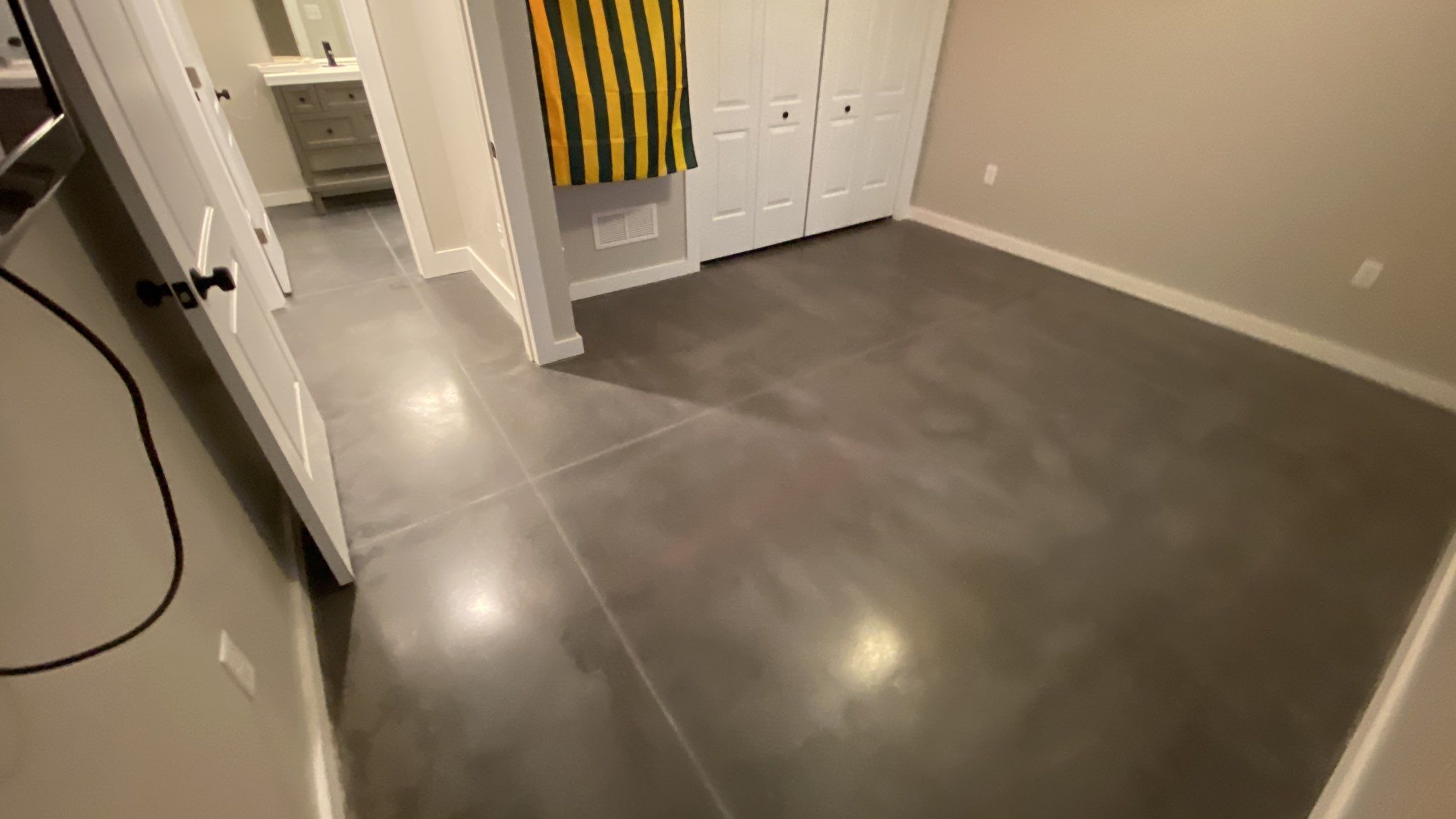 Louisburg, KS -- Basement Polish using Grey Stain by Big Red Decorative Concrete, LLC