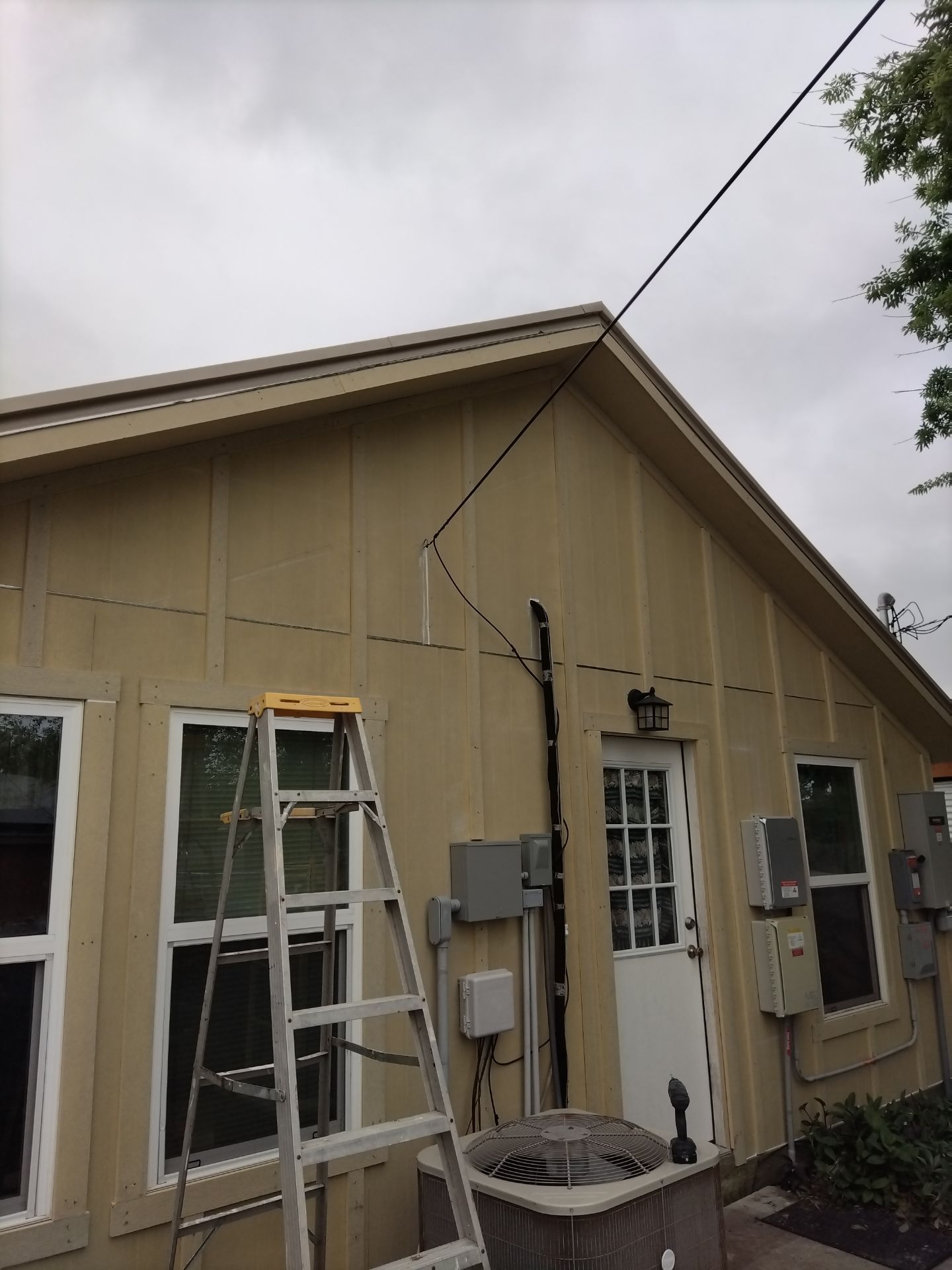 Vinyl to Hardie by Bayfront Roofing and Construction