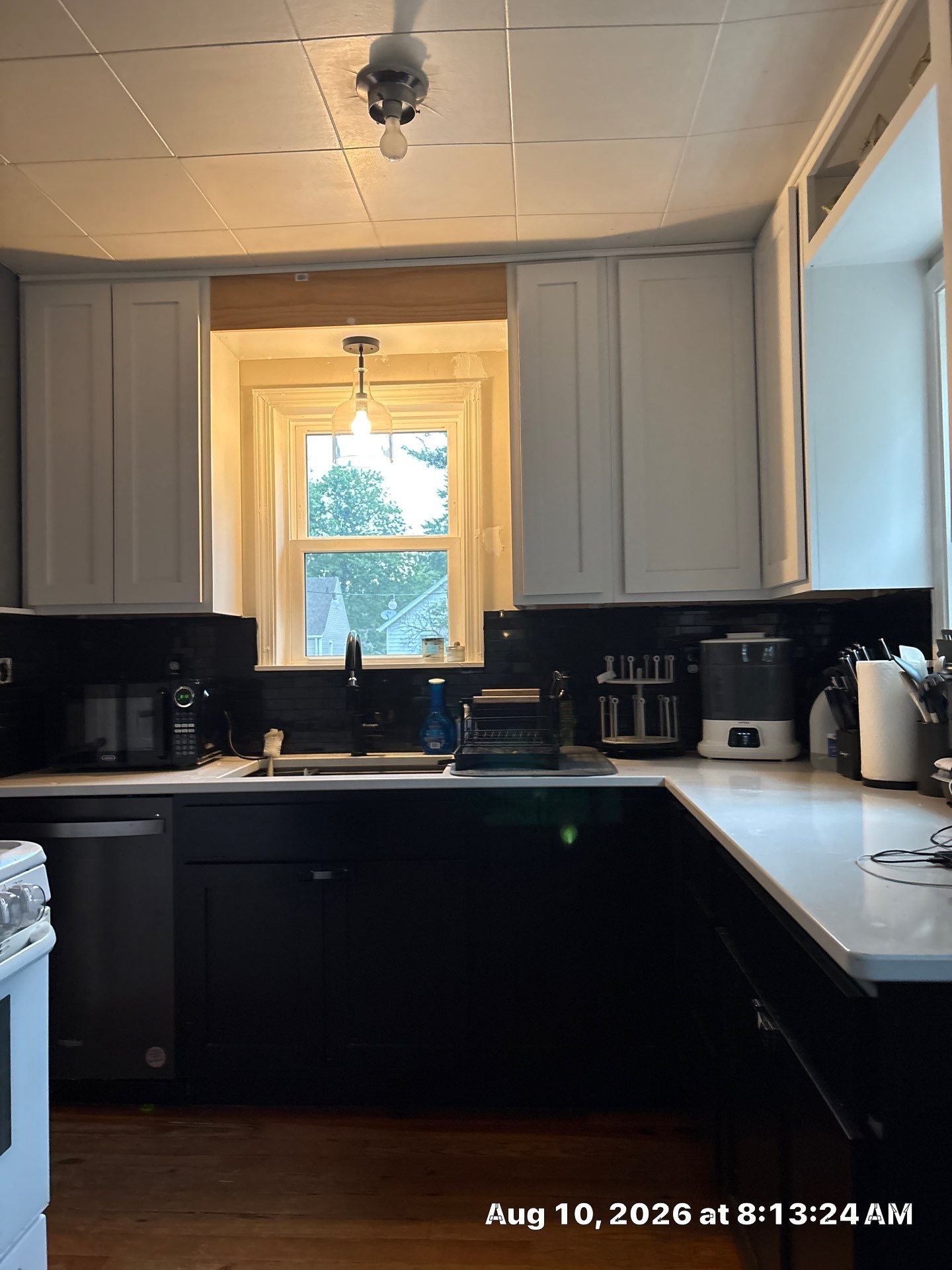 Modern Kitchen Renovation with Black and White Cabinetry in Lincoln by CompanyCam Sales Demo