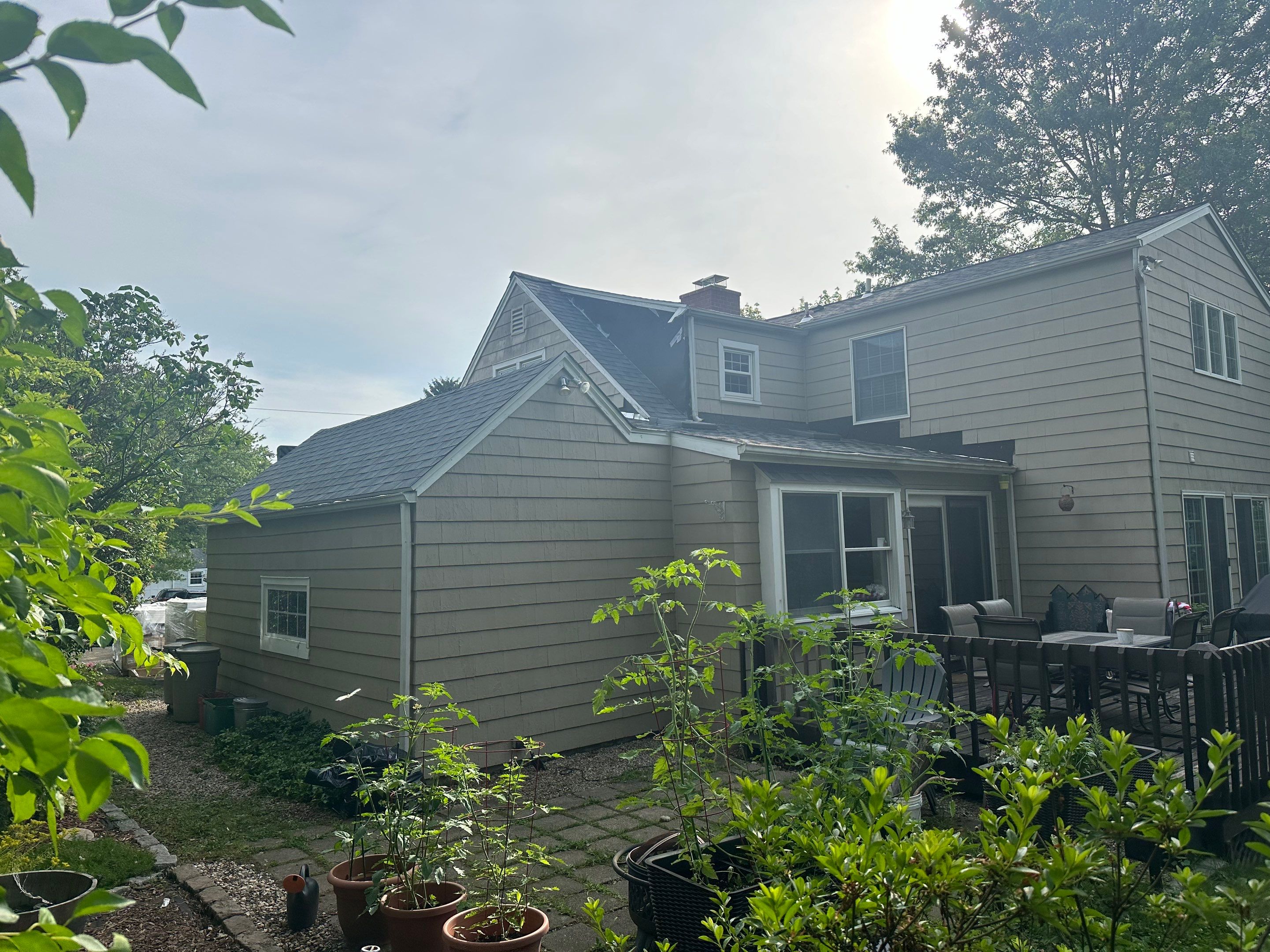 Complete Exterior Estate gray with Pacific Blue Siding by A Plus Exterior