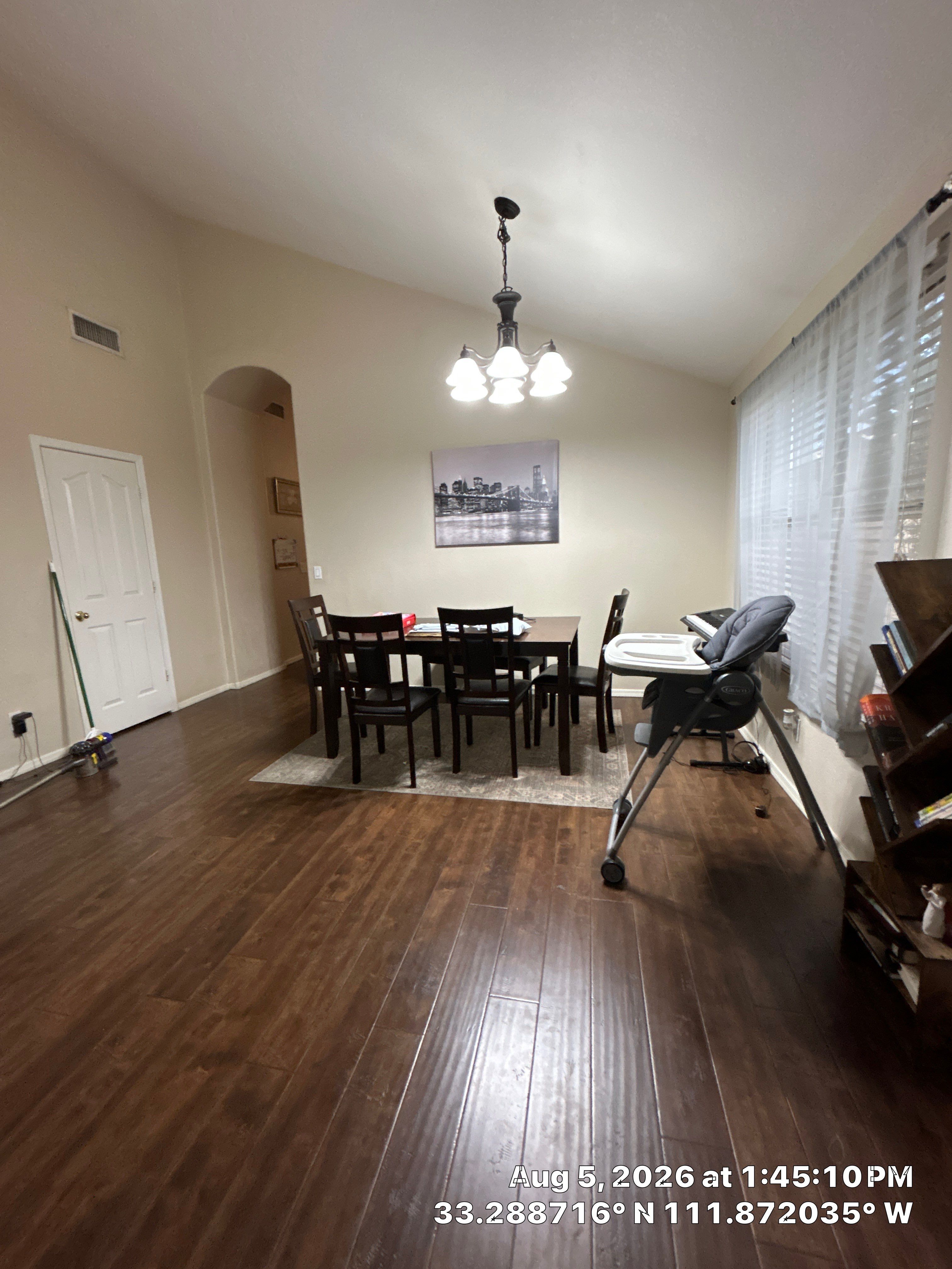 Chandler Dining Room Update with Dark Wood Laminate Flooring by CompanyCam Sales Demo