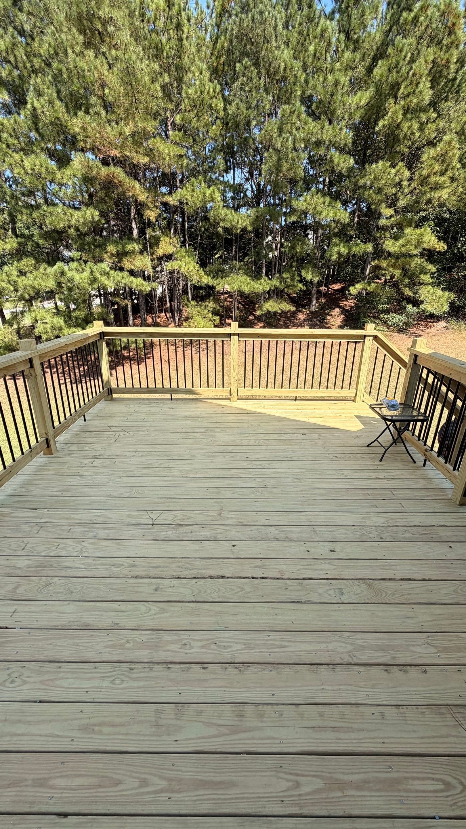 Elevated Pressure-Treated Deck and Staircase Rebuild in Douglasville by Swift Home Renovations