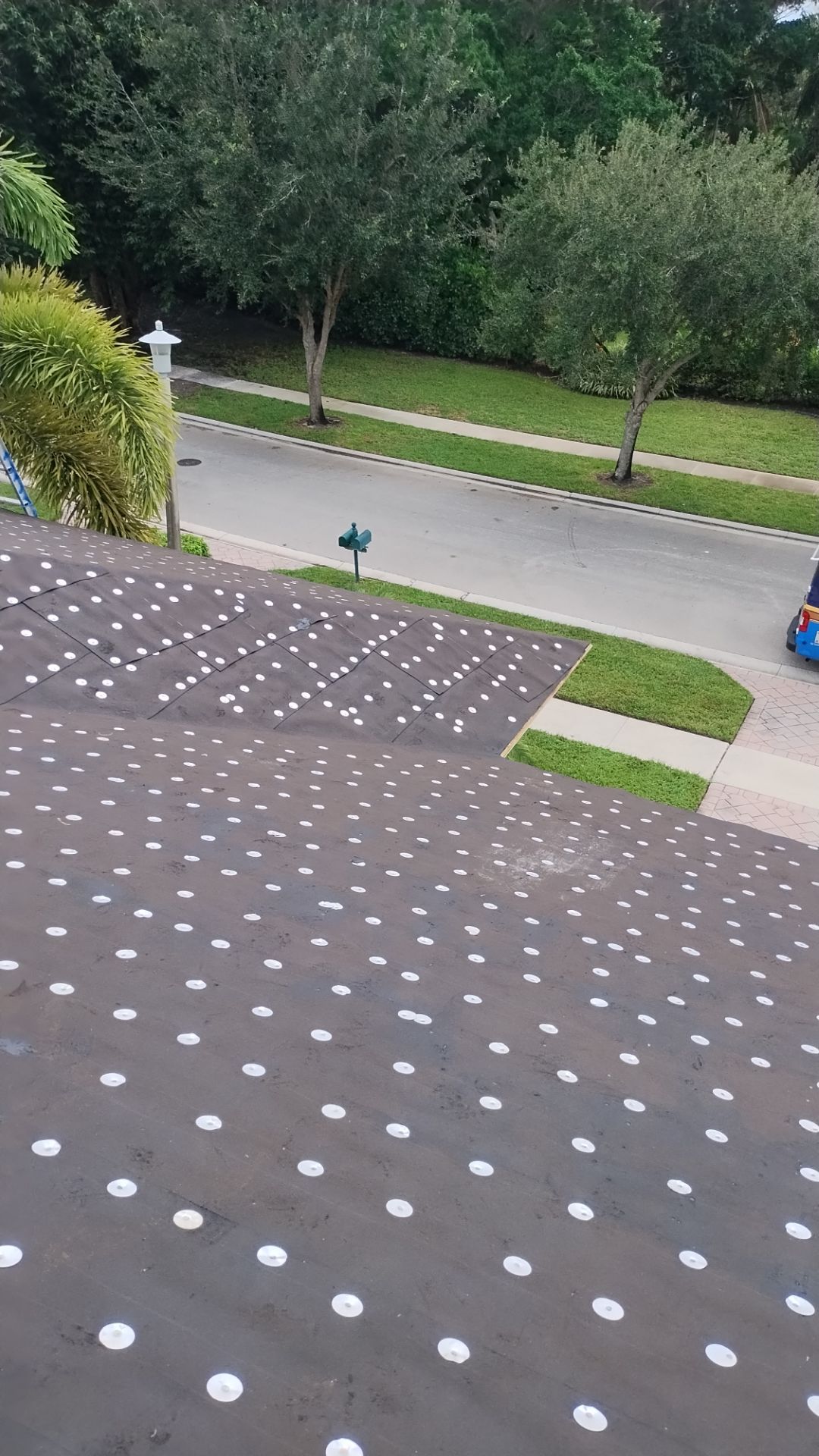 Residential Roofing Installation using 1" Nail strip metal roof by BLUES BROTHERS CONSTRUCTION CORP
