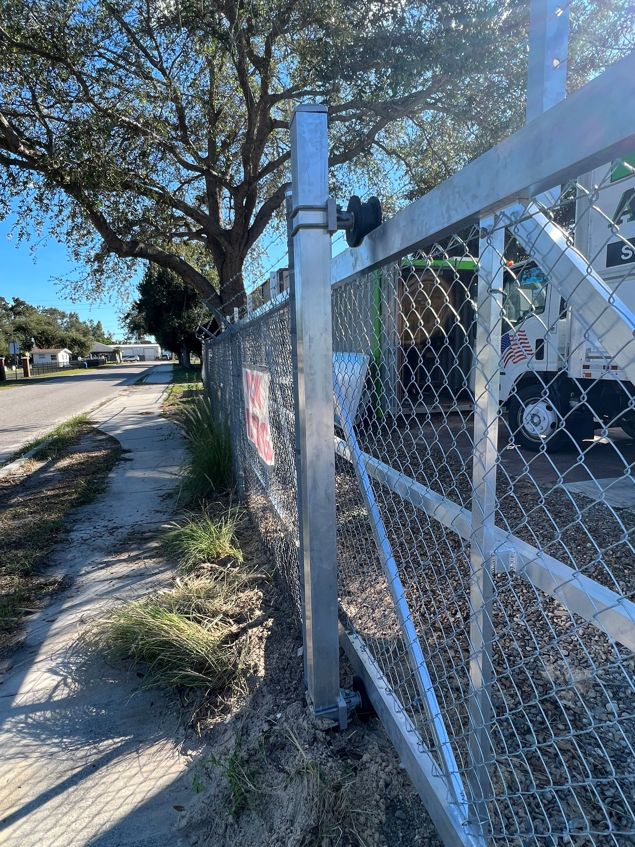 Commercial Fence Installation using Aluminum Estate Gate by Asap fence and gates, LLC