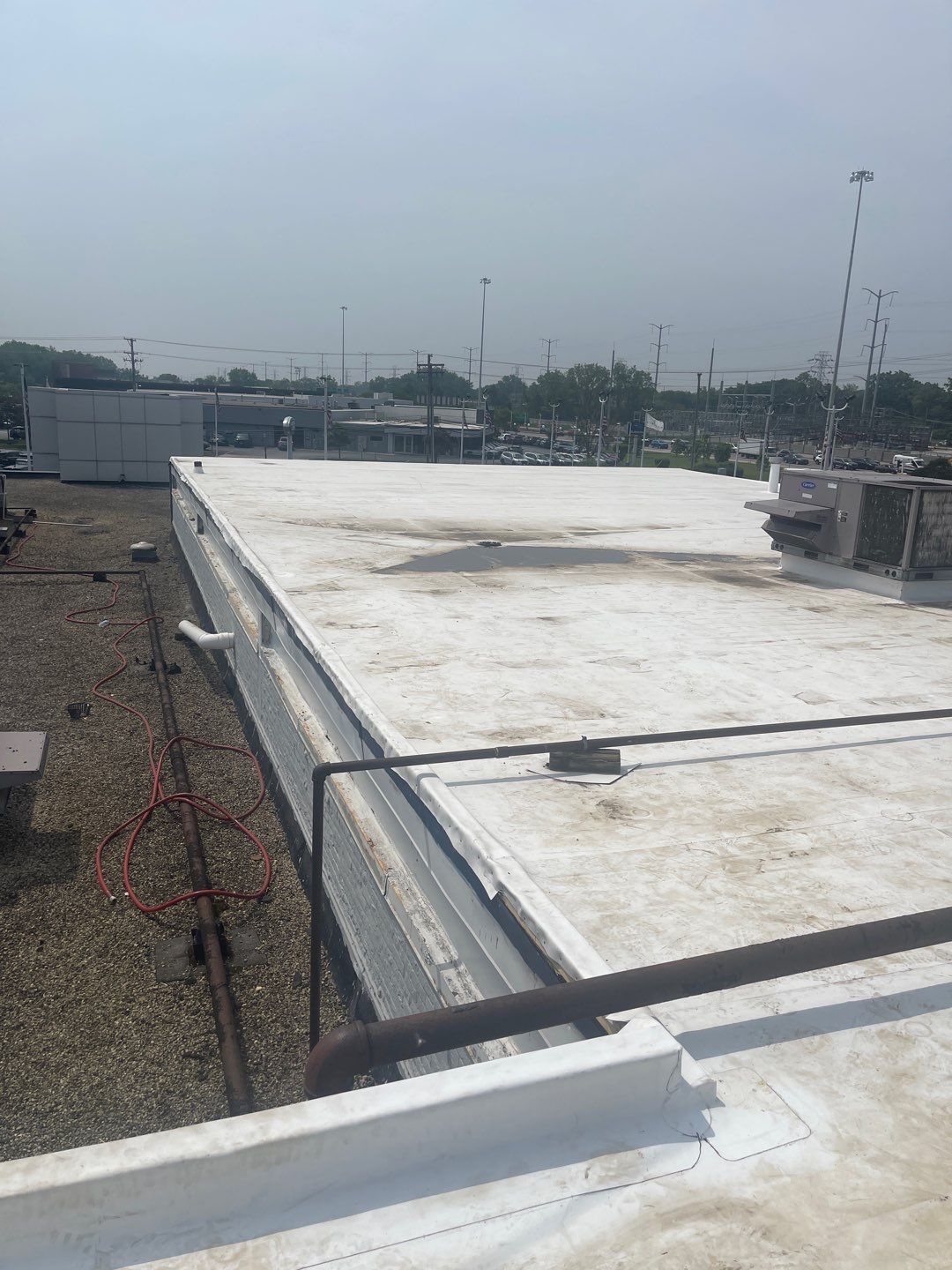 Ford Dealership - Re-Roof by Pink Roofing