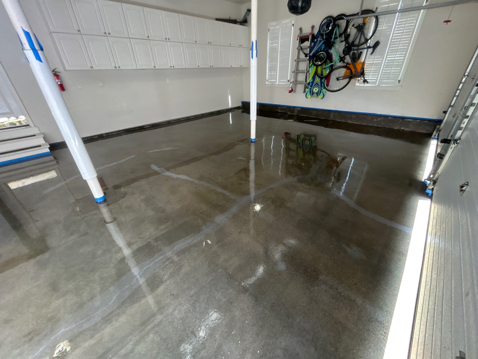 Concrete Floor Coating Transformation by DiGiorgi Roofing and Siding Inc