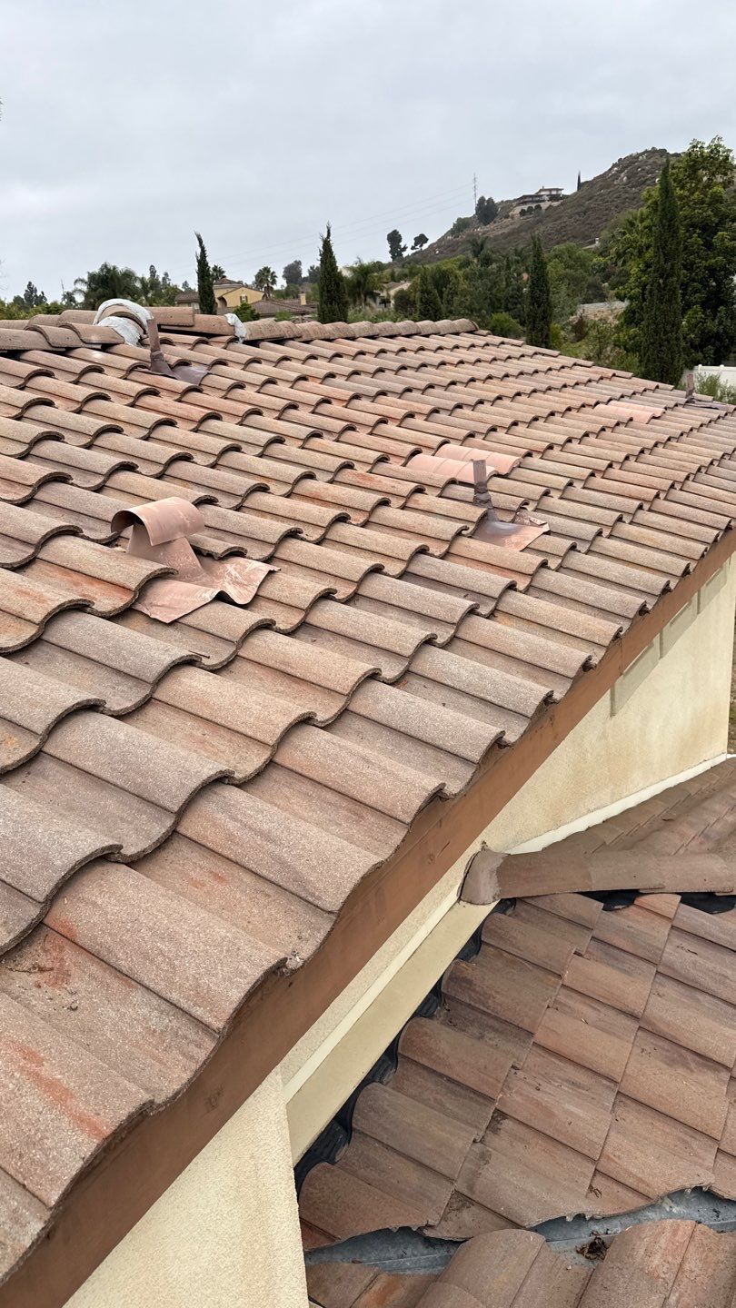 Terracotta Tile Roof Repair and Ridge Cap Sealing in Escondido by Reliable Roofing San Diego Inc.