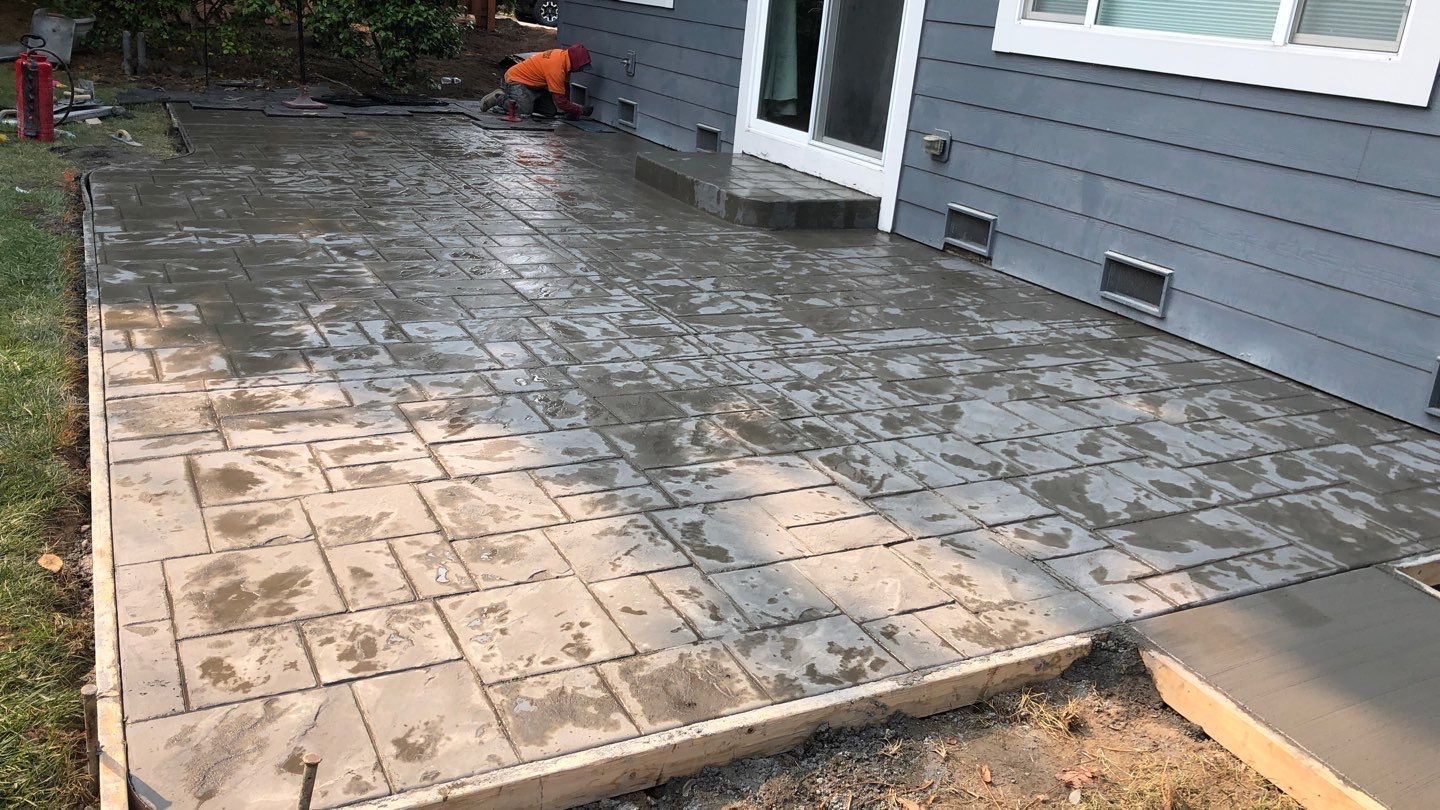  Amy | Stamped Finish Patio, Concrete Project by Jireh Asphalt & Concrete Inc 
