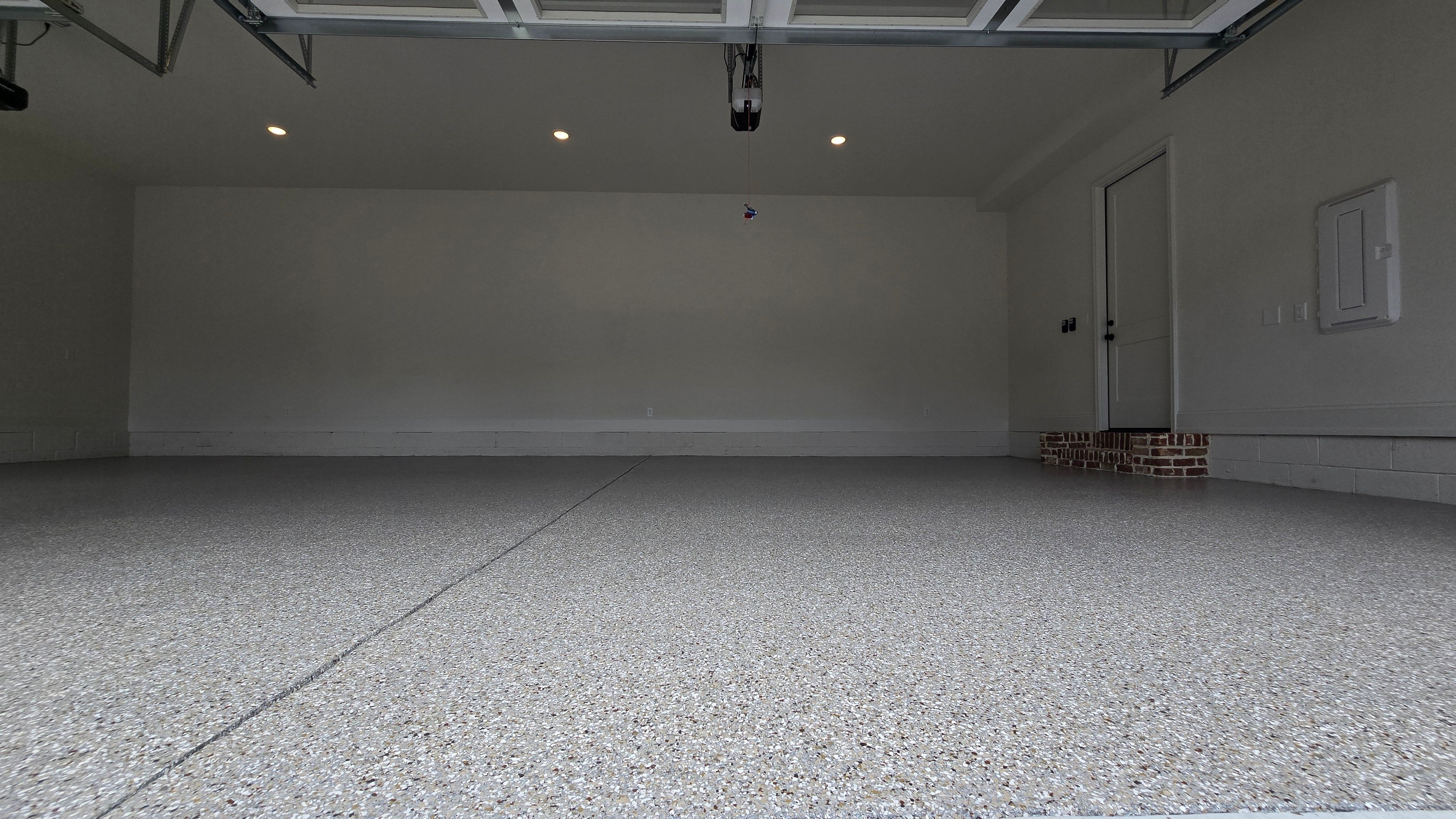 Garage Using Creekbed  by Elite Floor Solutions