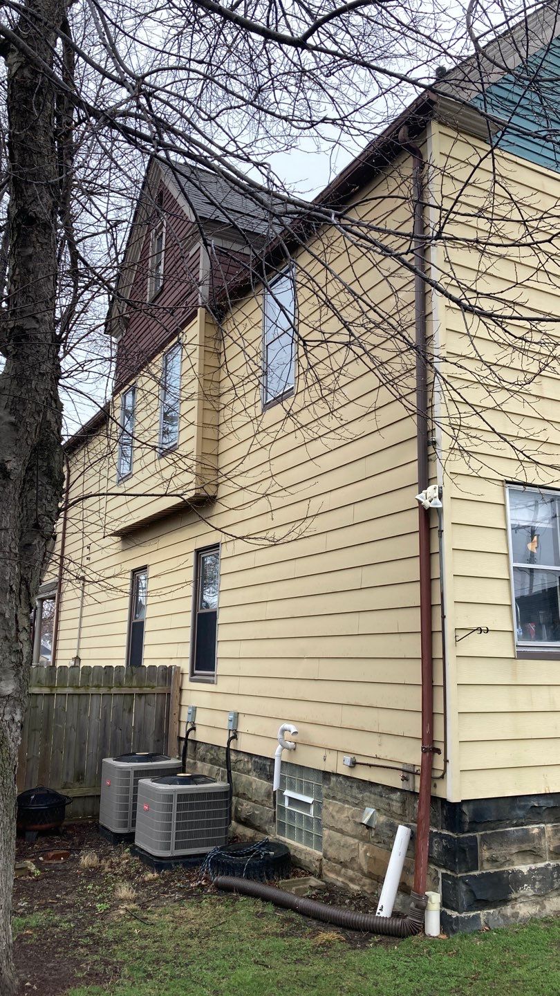 James Hardie Siding on Antique Home by Absolute Roofing and Construction