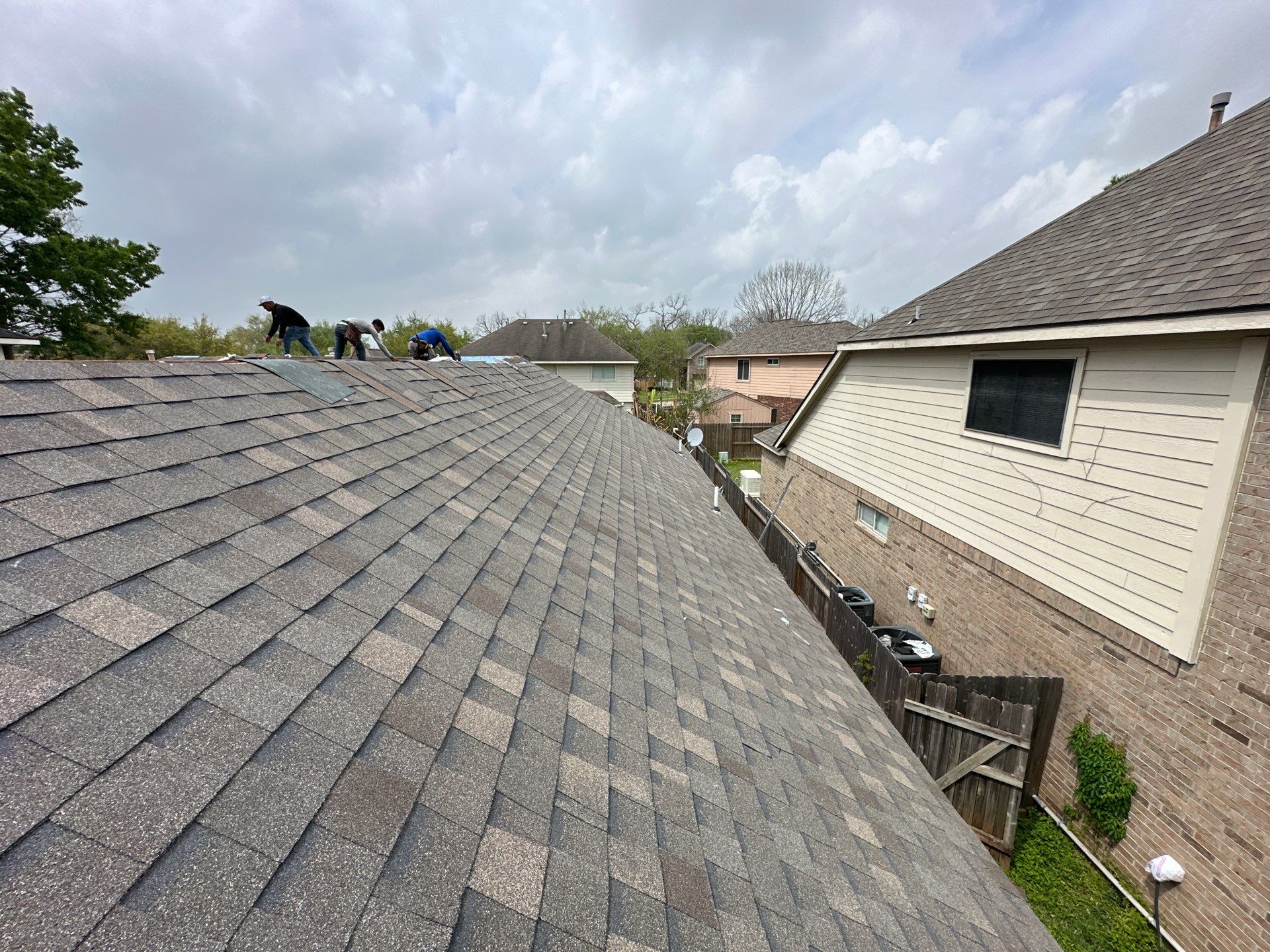 Residential Roofing Installation using Atlas Prolam by Motion Roofing