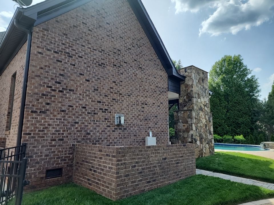 House Wash using cleaner by Power Wash Masters LLC