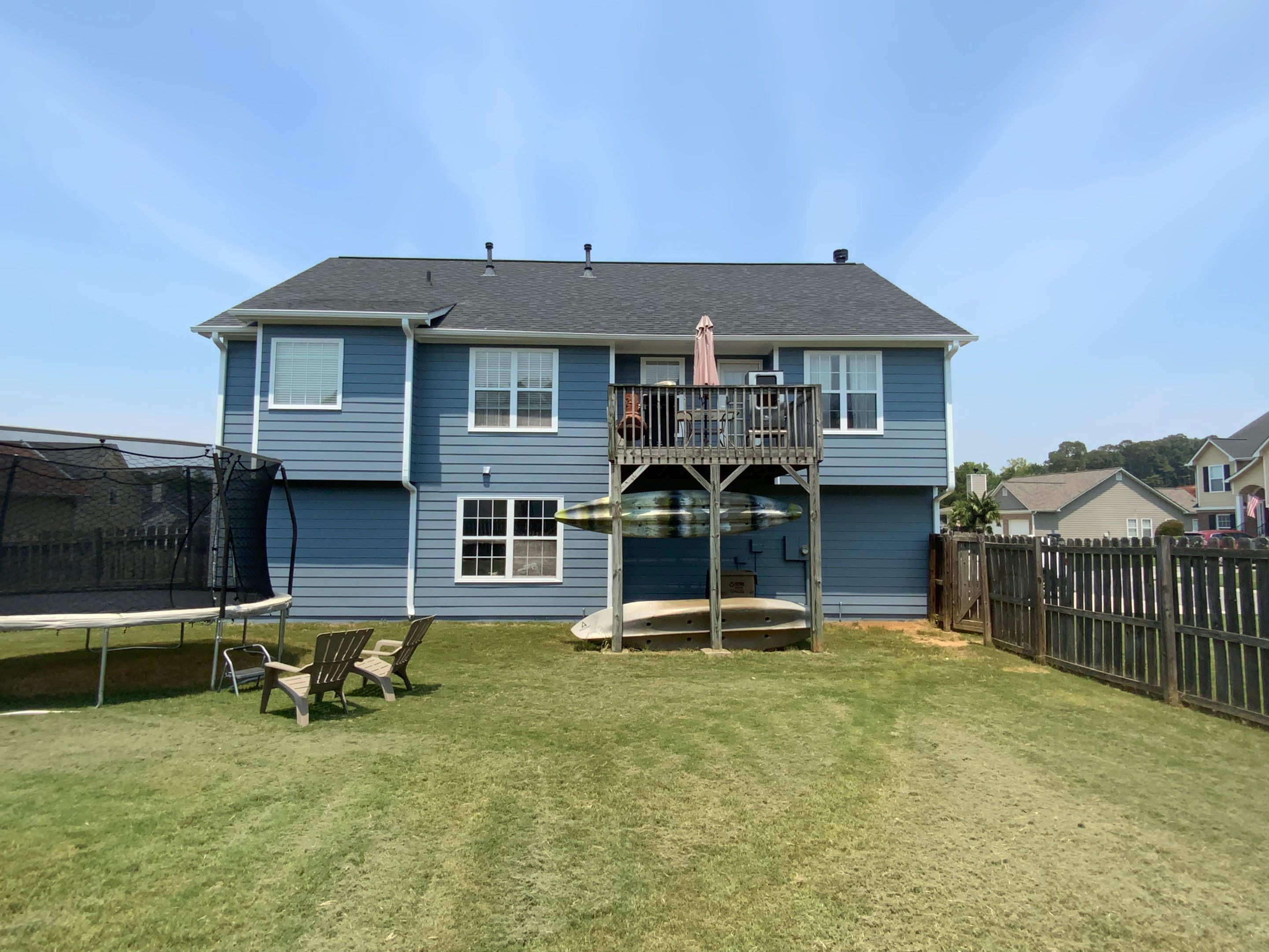 Comprehensive Exterior Painting for Cartersville Home with Blue Siding Transformation by Swift Home Renovations