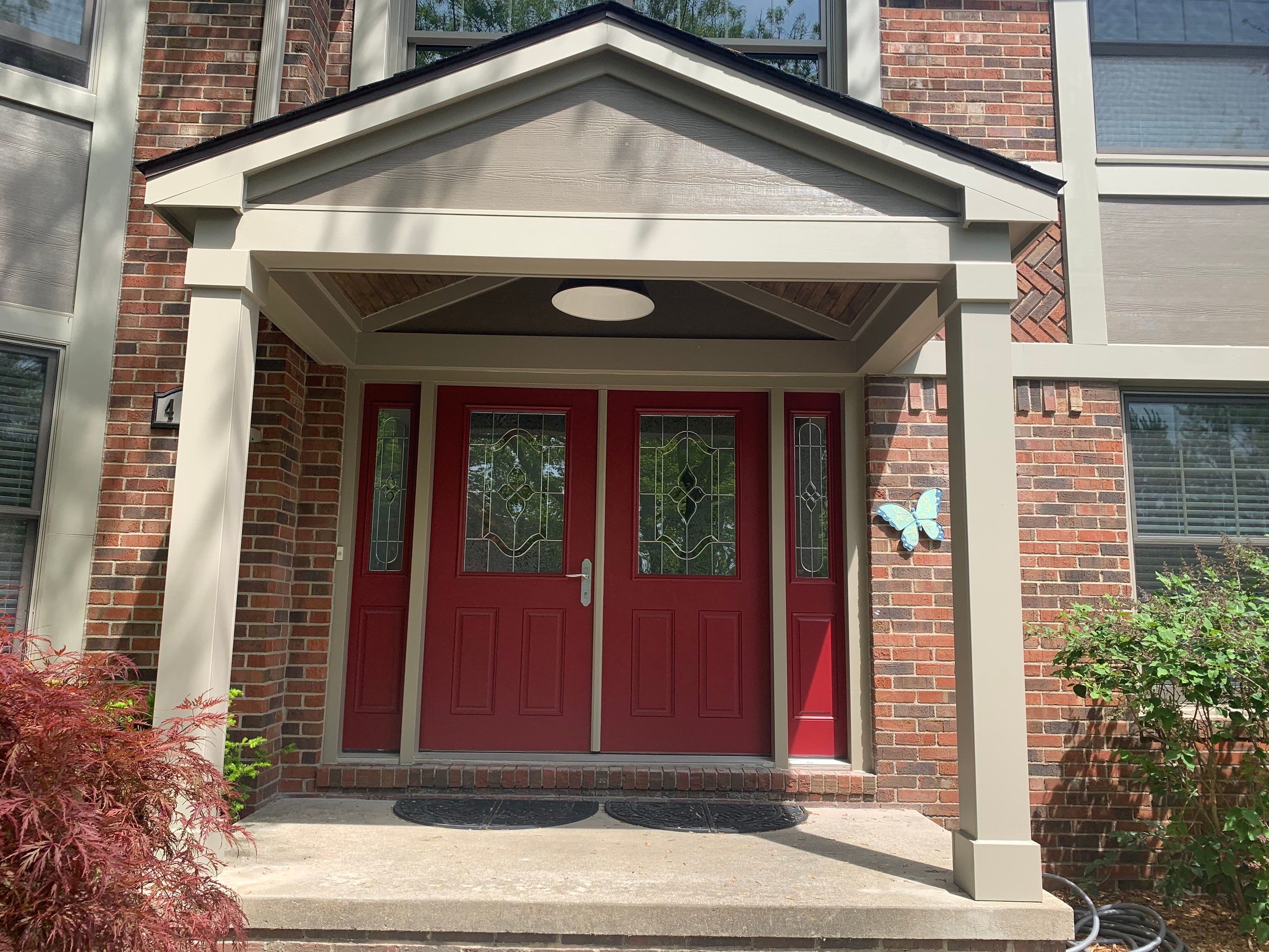 James Hardie Siding Replacement & Porch Addition by Bloomfield Construction & Restoration