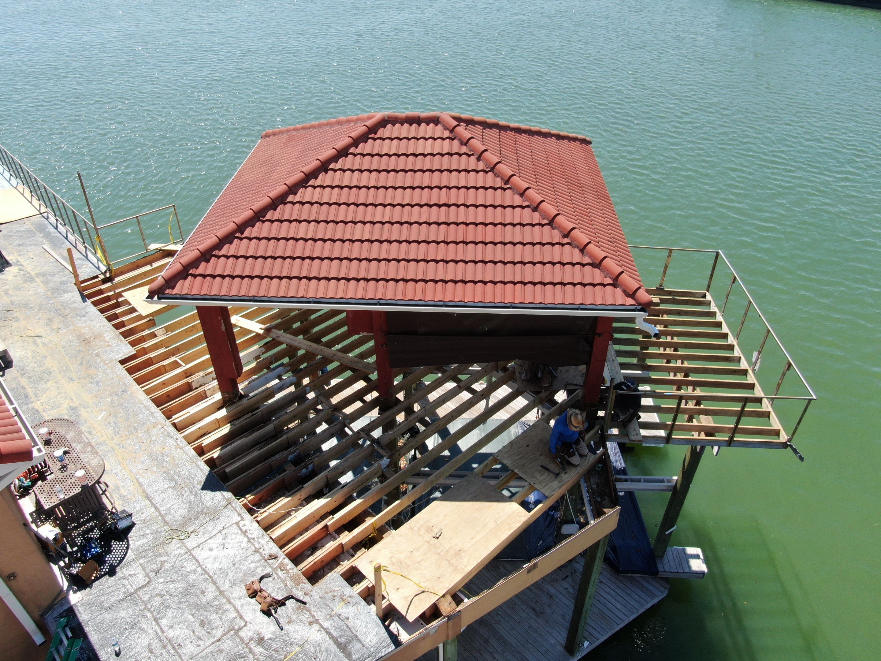 Walk Out Patio Cover by Bayfront Roofing and Construction