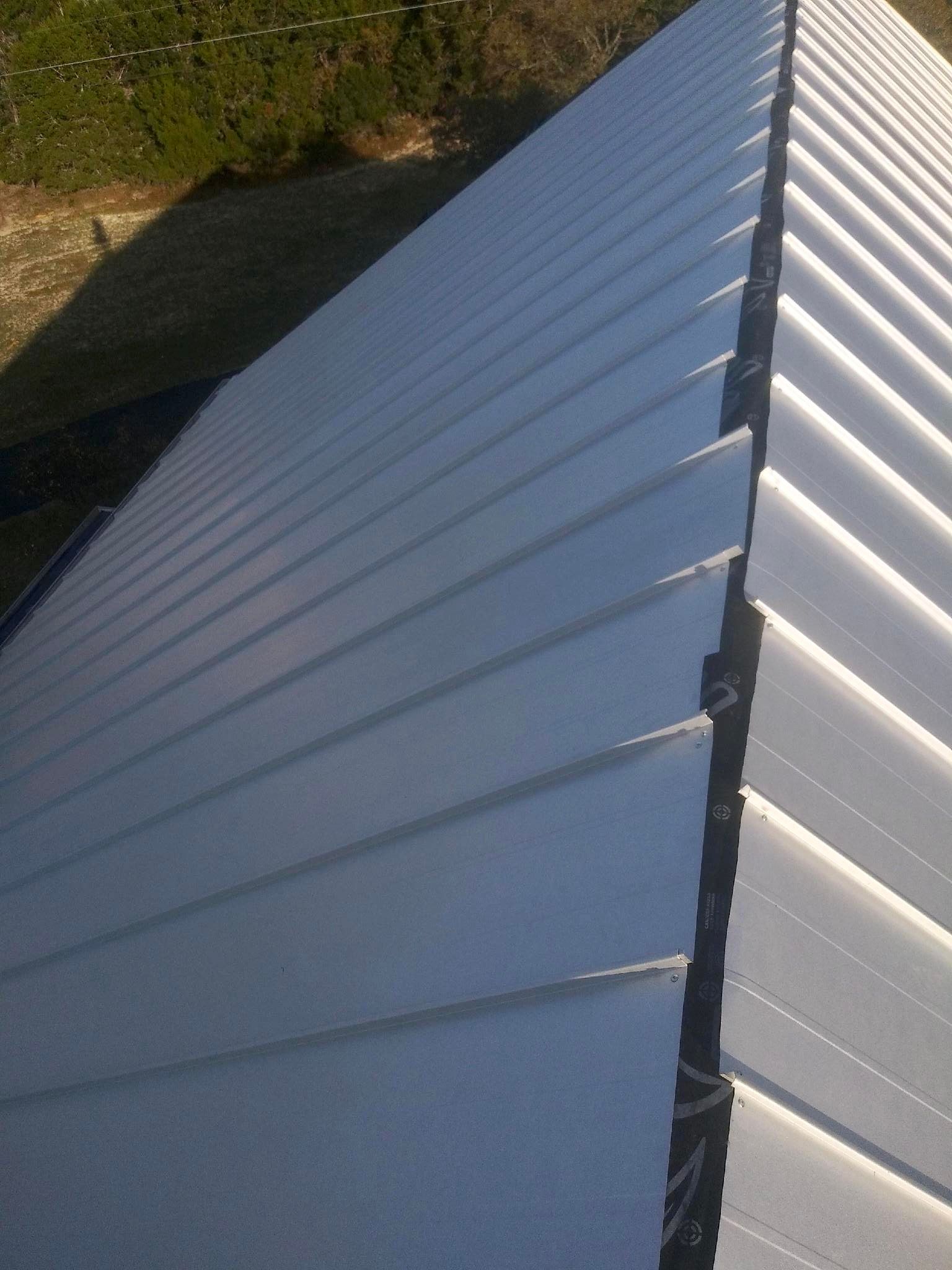 Residential Metal Roof Installation using McElroy Metal by Premier Roofing and Contracting