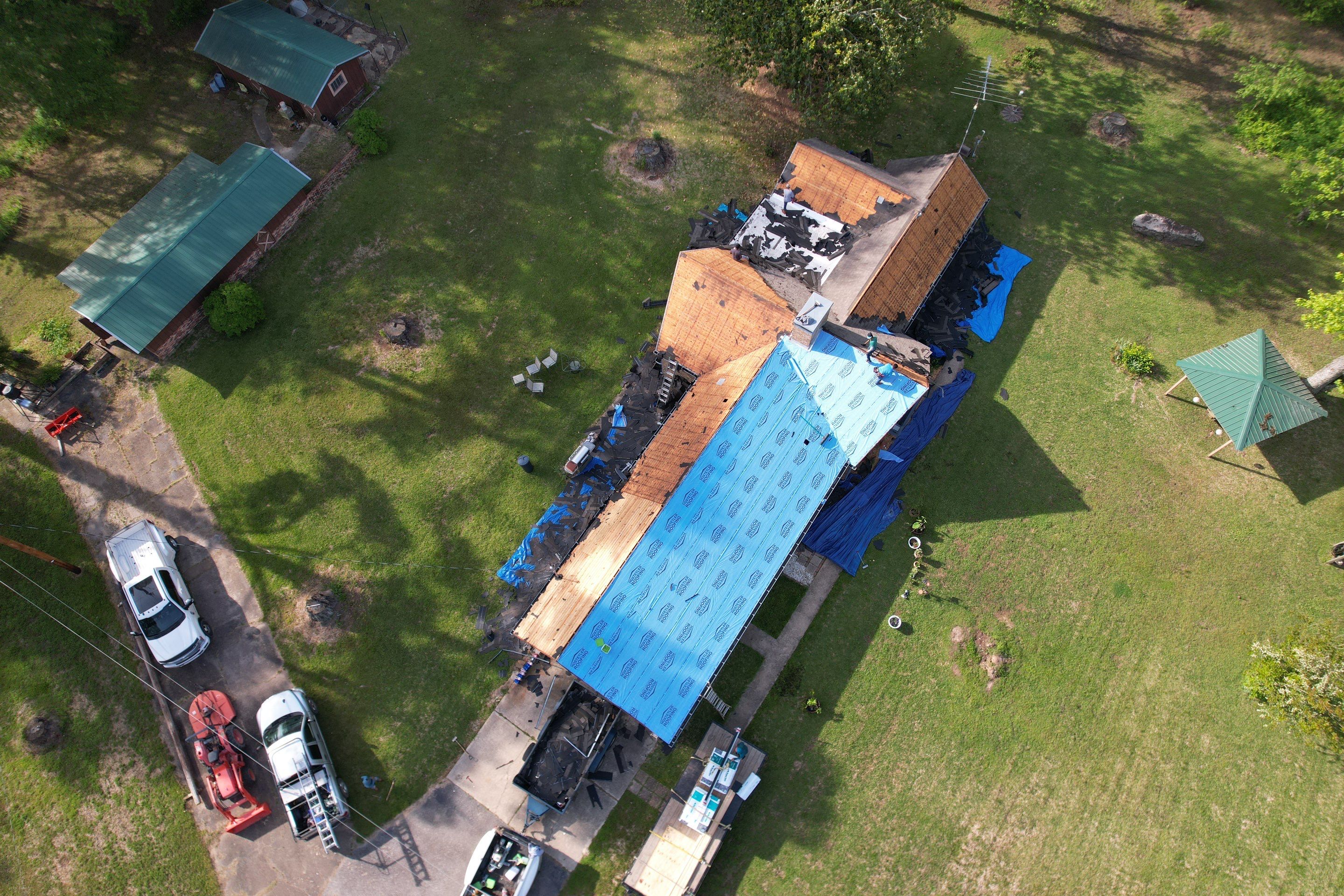 Residential Roofing Installation using 50 mil PVC by Hostetler Roofing