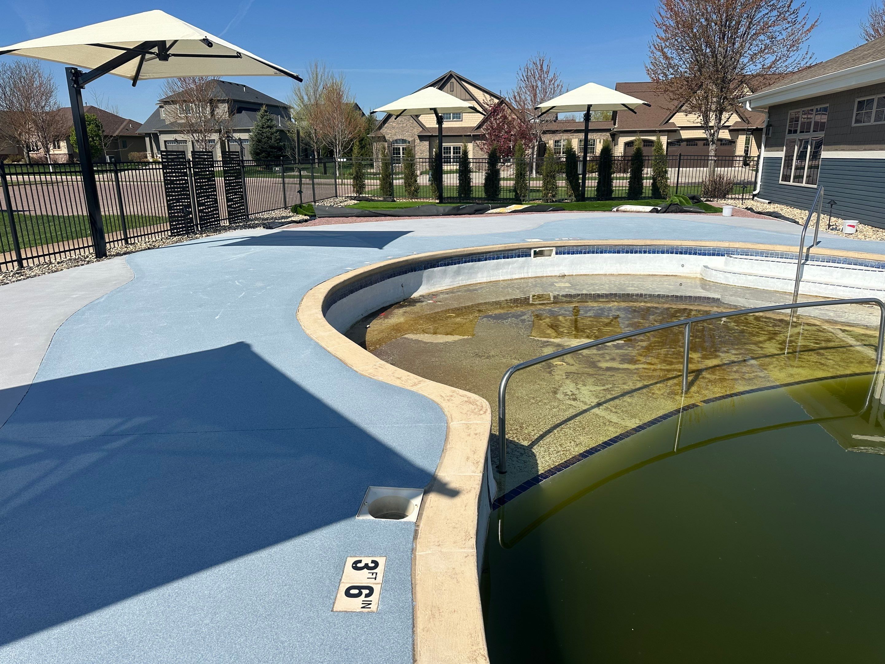 Arbors Edge Pool Deck Restoration and Textured Concrete Coating by Select Painting, Coatings & Garage Cabinets