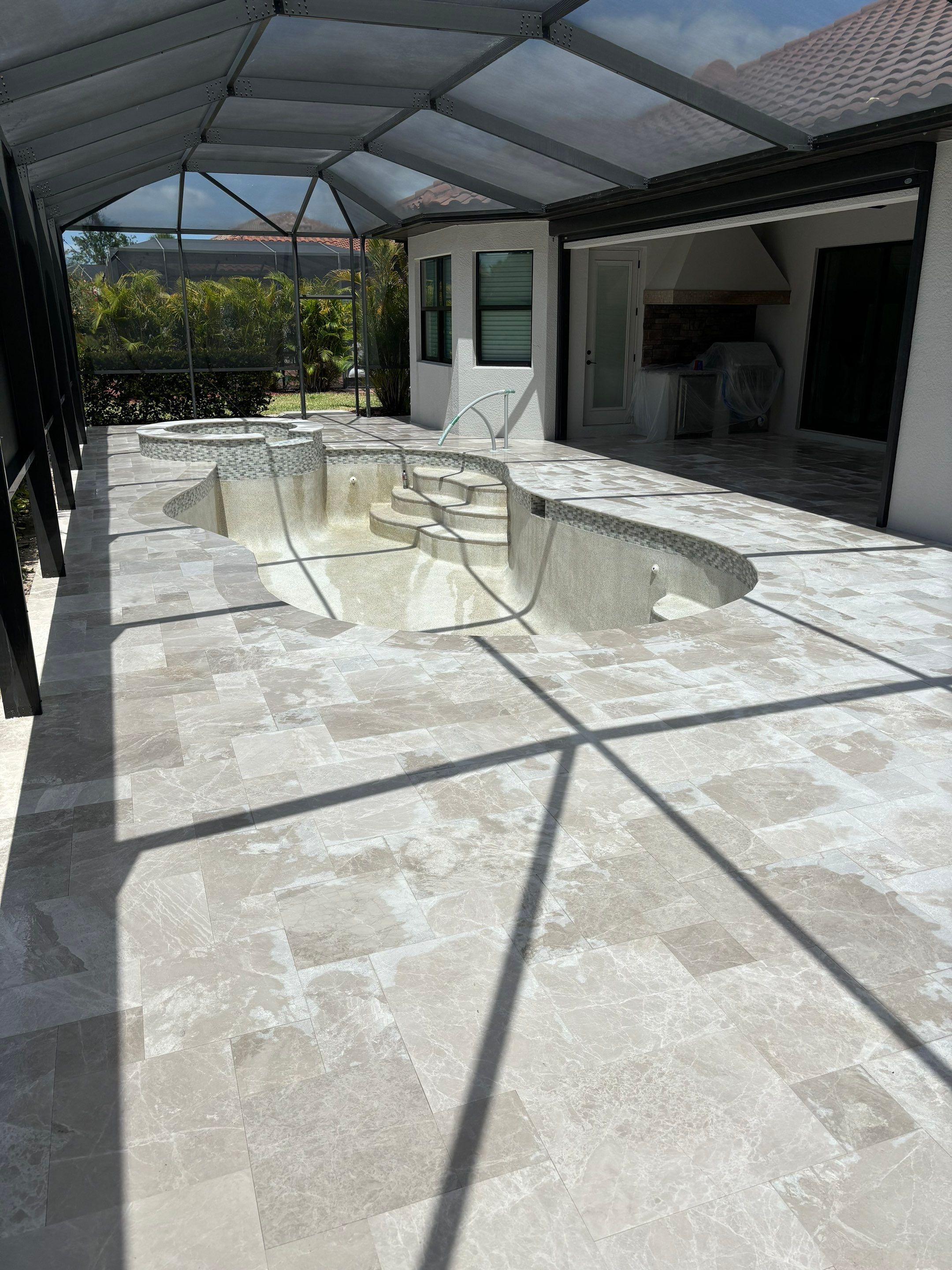 Textured Marble Pool Deck - Bonita National Golf & Country Club by Old Town Pavers Llc