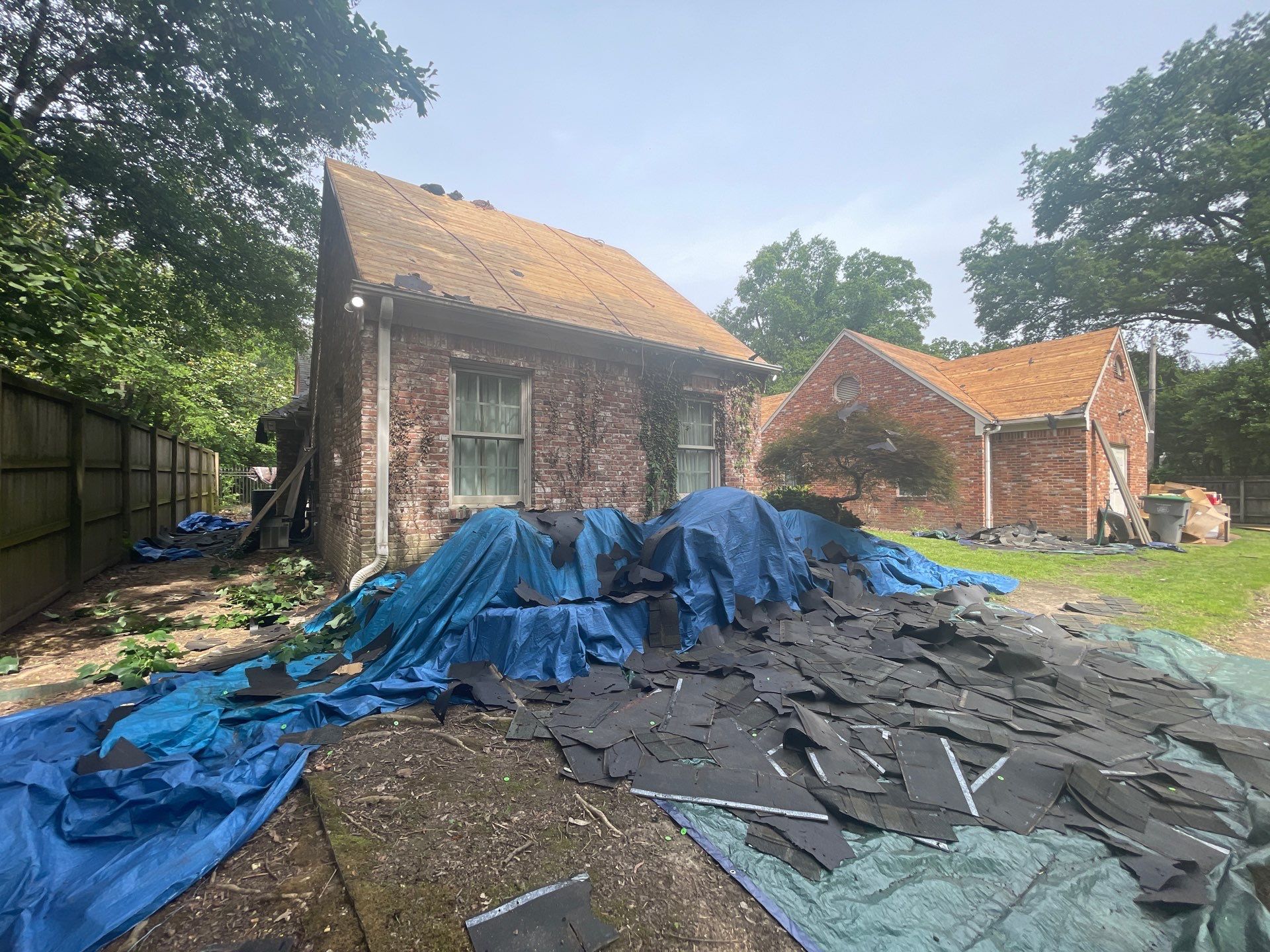 Full Roof Replacement with gutter upgrade after tree impact damage in East Memphis by Revival Roofing Services