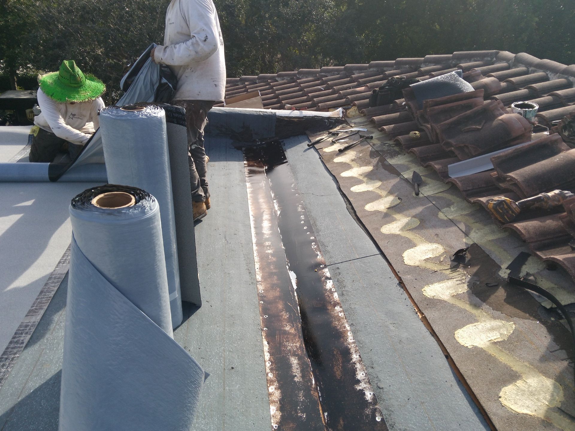 West Palm Beach Roof Restoration and Travertine Paver Driveway Installation by Aastro Roofing